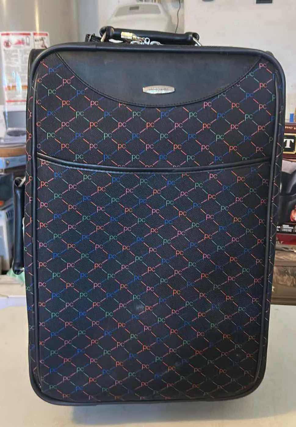 Photo 1 of PIERRE CARDIN 22” WHEELS LUGGAGE