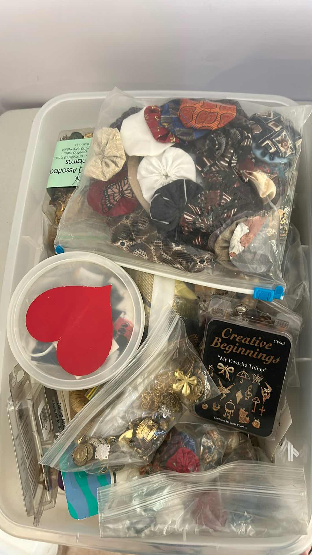 Photo 1 of 2- PLASTIC CONTAINERS BEAD TRIM AND CHARMS
