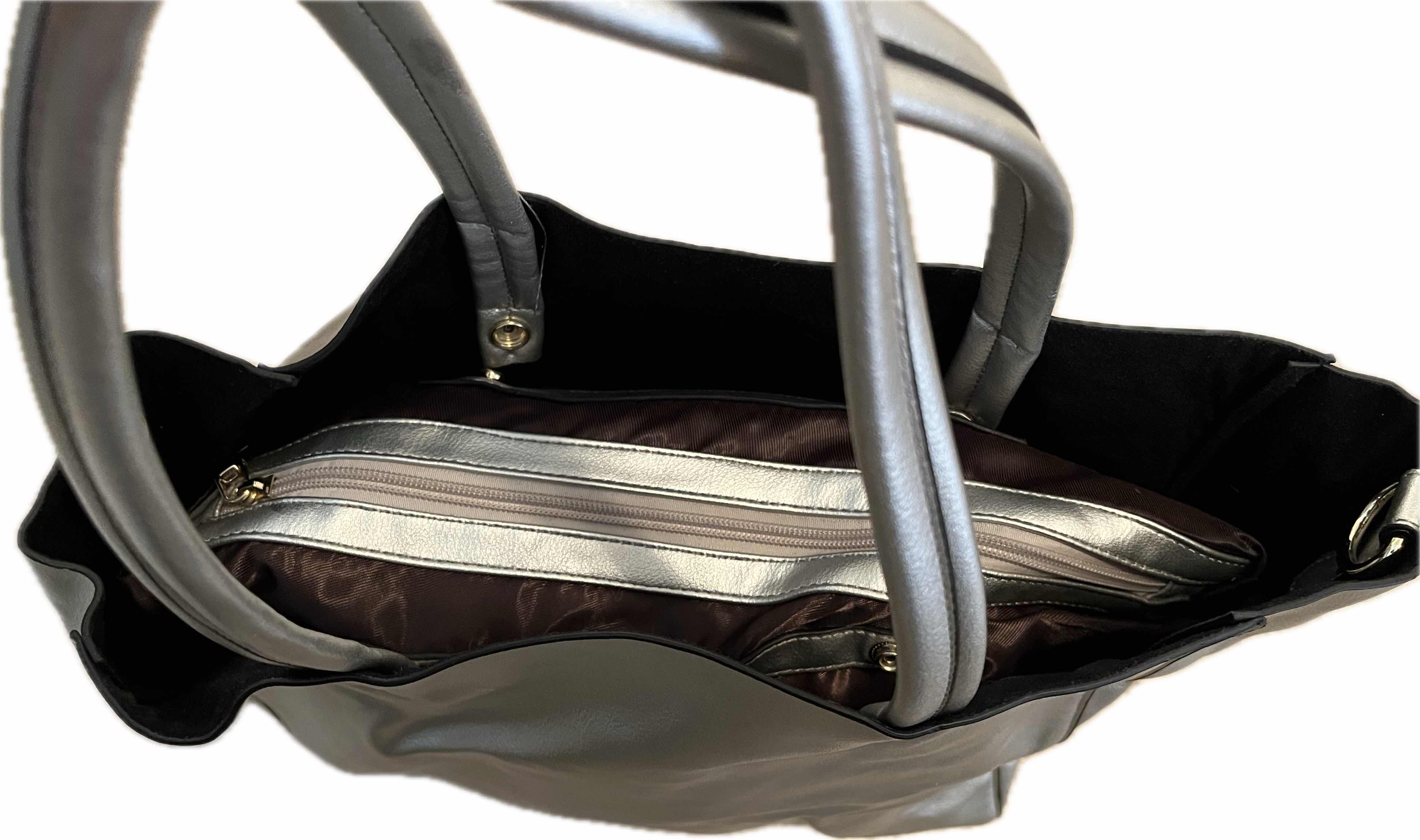 Photo 1 of VINTAGE WOMEN’S BAGS BLACK AND SILVER LEATHER REFLECTIONS