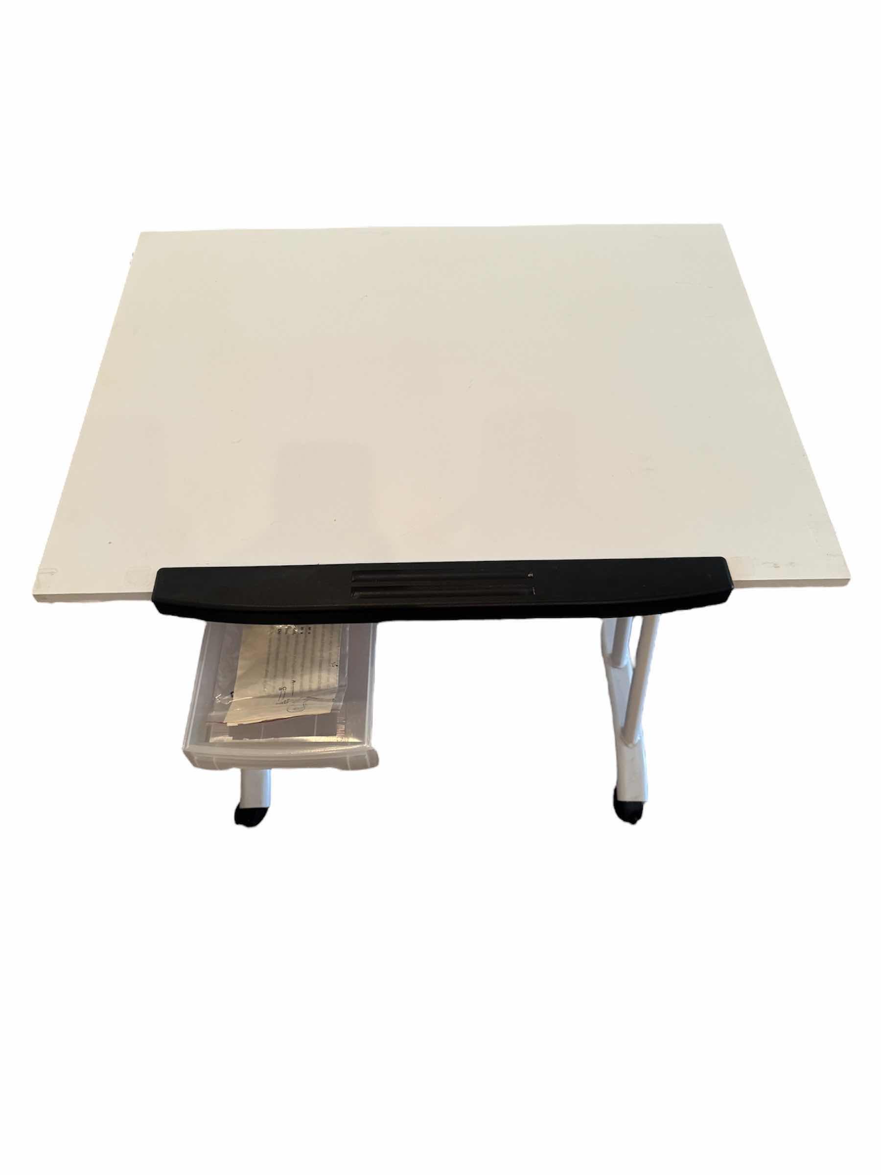 Photo 1 of 50
WHITE MOBILE ADJUSTABLE DESK WITH DRAWER, ROLLING CRAFT TABLE

23.5” X 32” X H30”