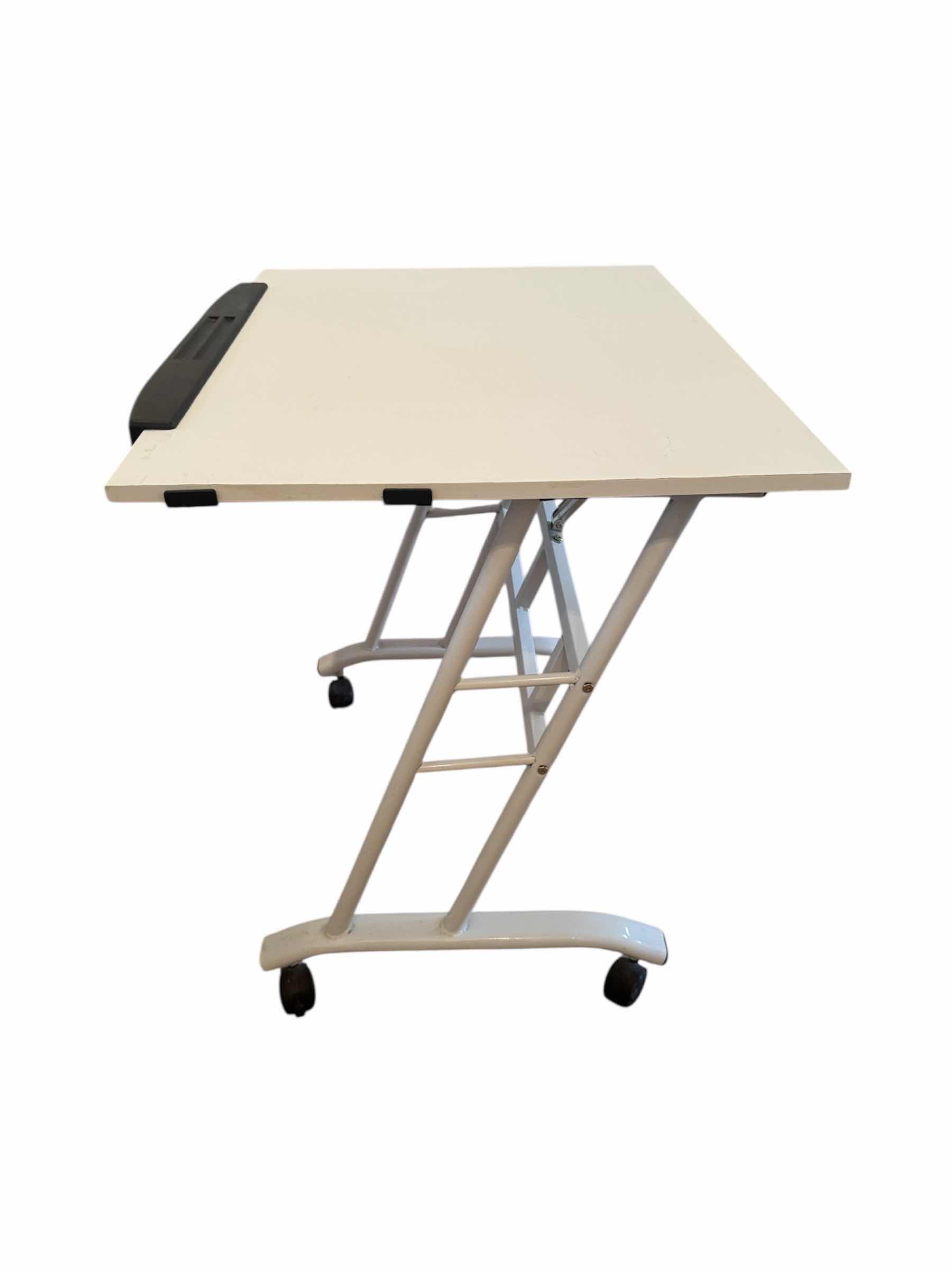 Photo 1 of 50
WHITE MOBILE ADJUSTABLE DESK WITH DRAWER, ROLLING CRAFT TABLE

23.5” X 32” X H30”