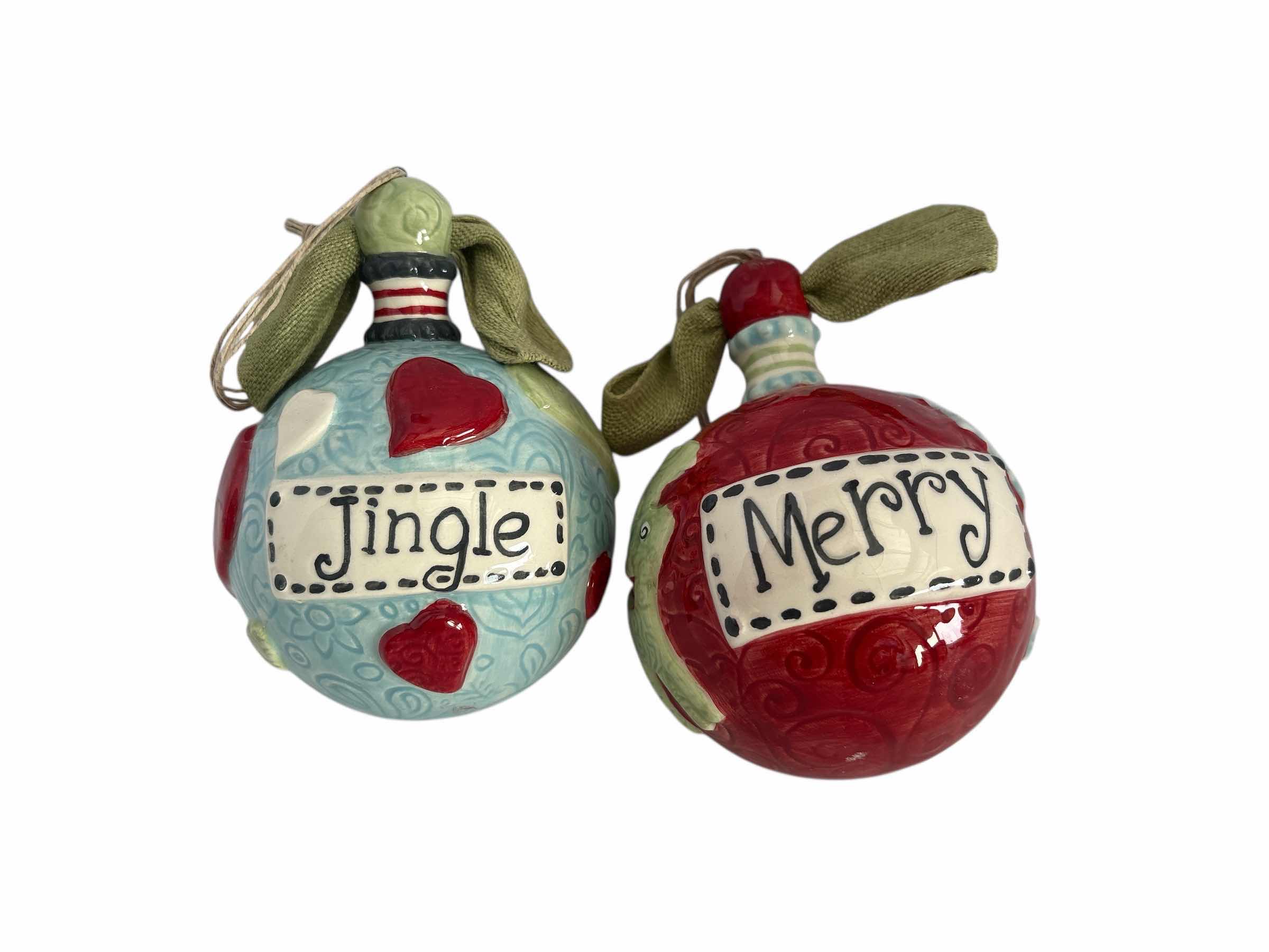 Photo 1 of TWO HANDCRAFTED ROUND CERAMIC ORNAMENTS 6”