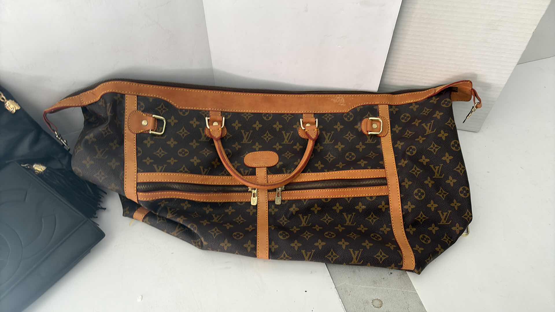 Photo 1 of VINTAGE FAUX CHANEL HANDBAGS 14” & FAUX LOUIS VUITTON DUFFEL BAG 24” (REPLICAS, NOT AUTHENTIC)