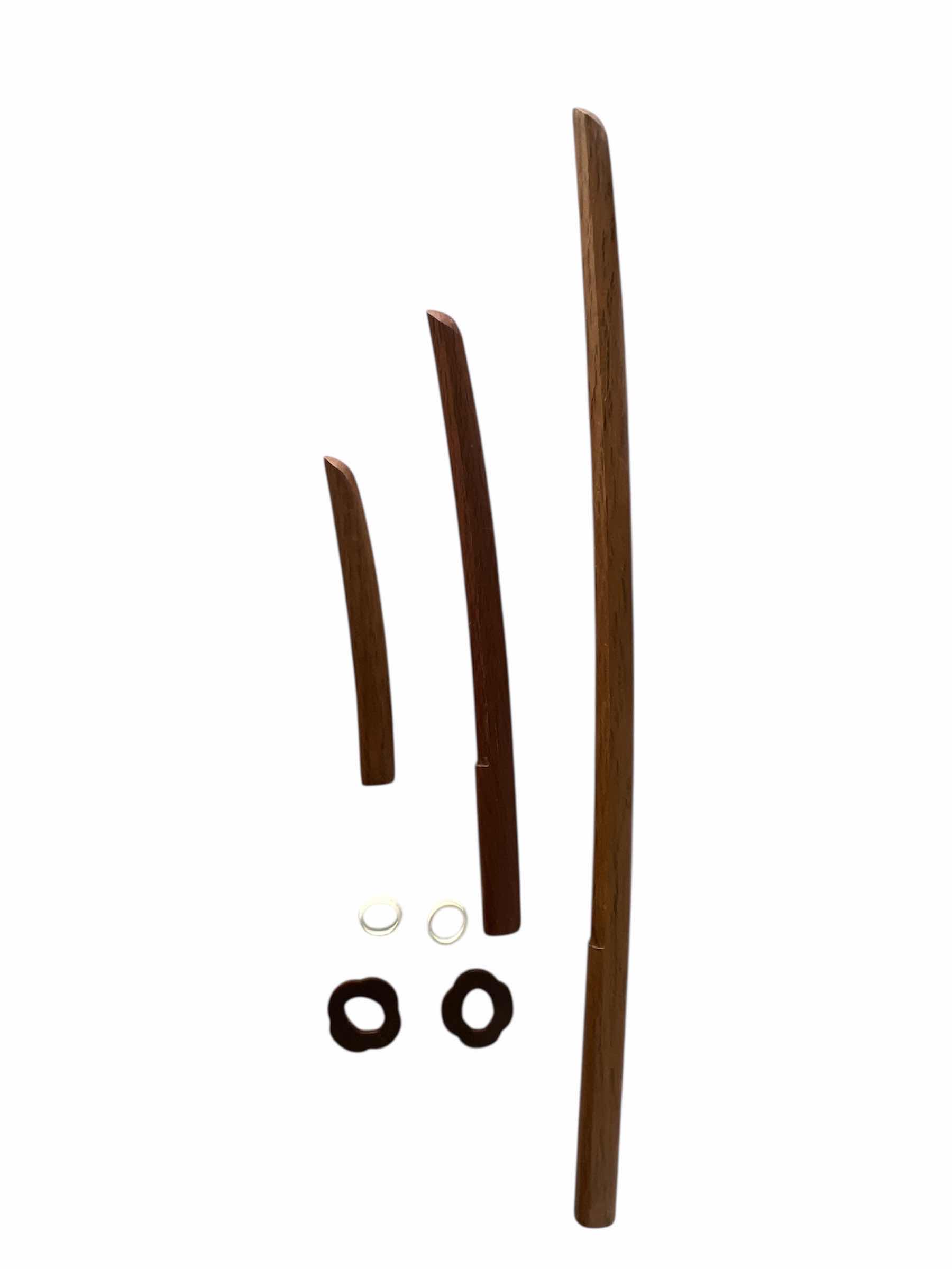 Photo 1 of BOKKEN JAPANESE TRAINING WEAPONS SET. INCLUDES 3 SWORDS AND HOLDERS. $200