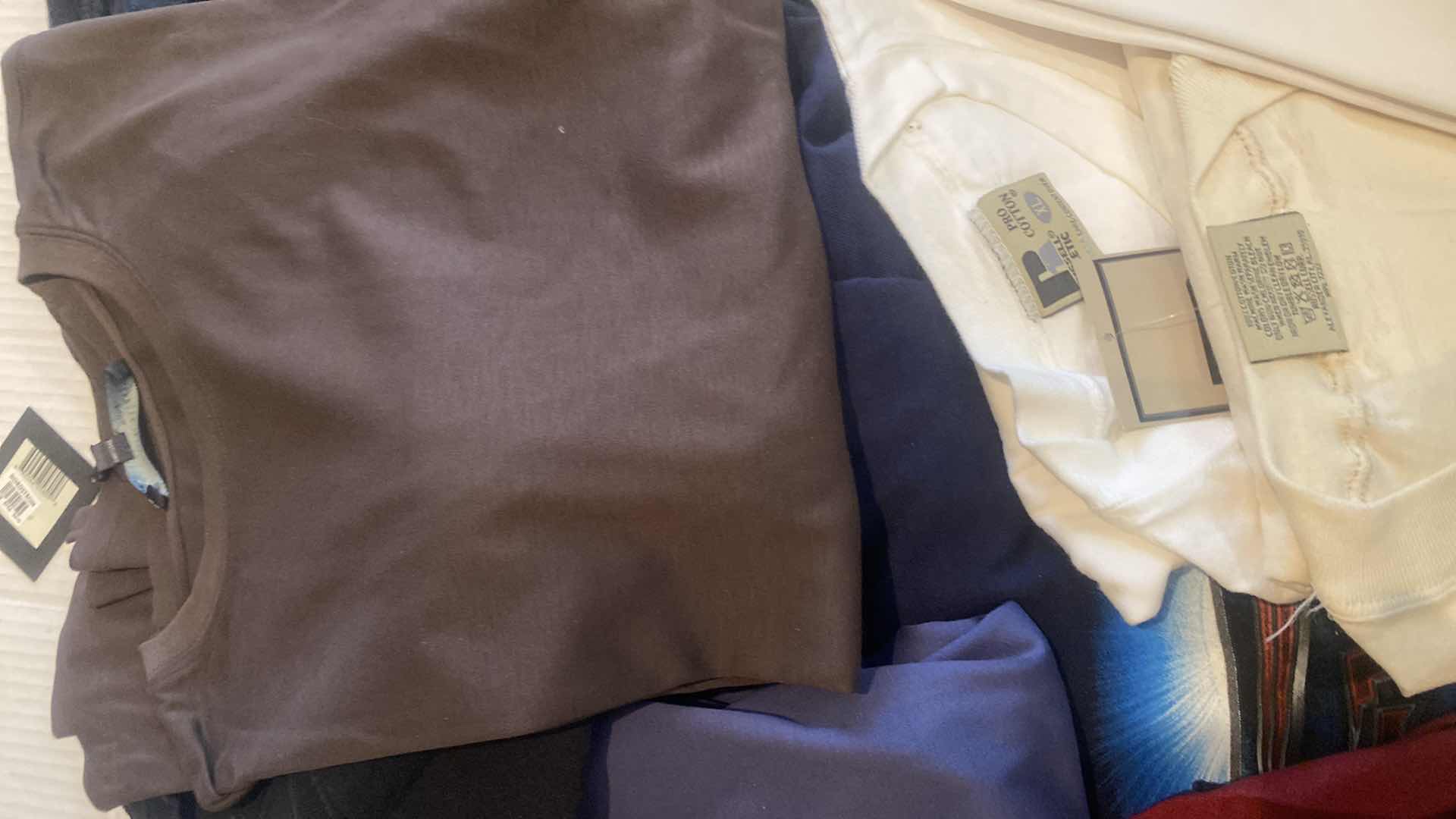 Photo 1 of T-SHIRTS SIZES LARGE AND X LARGE