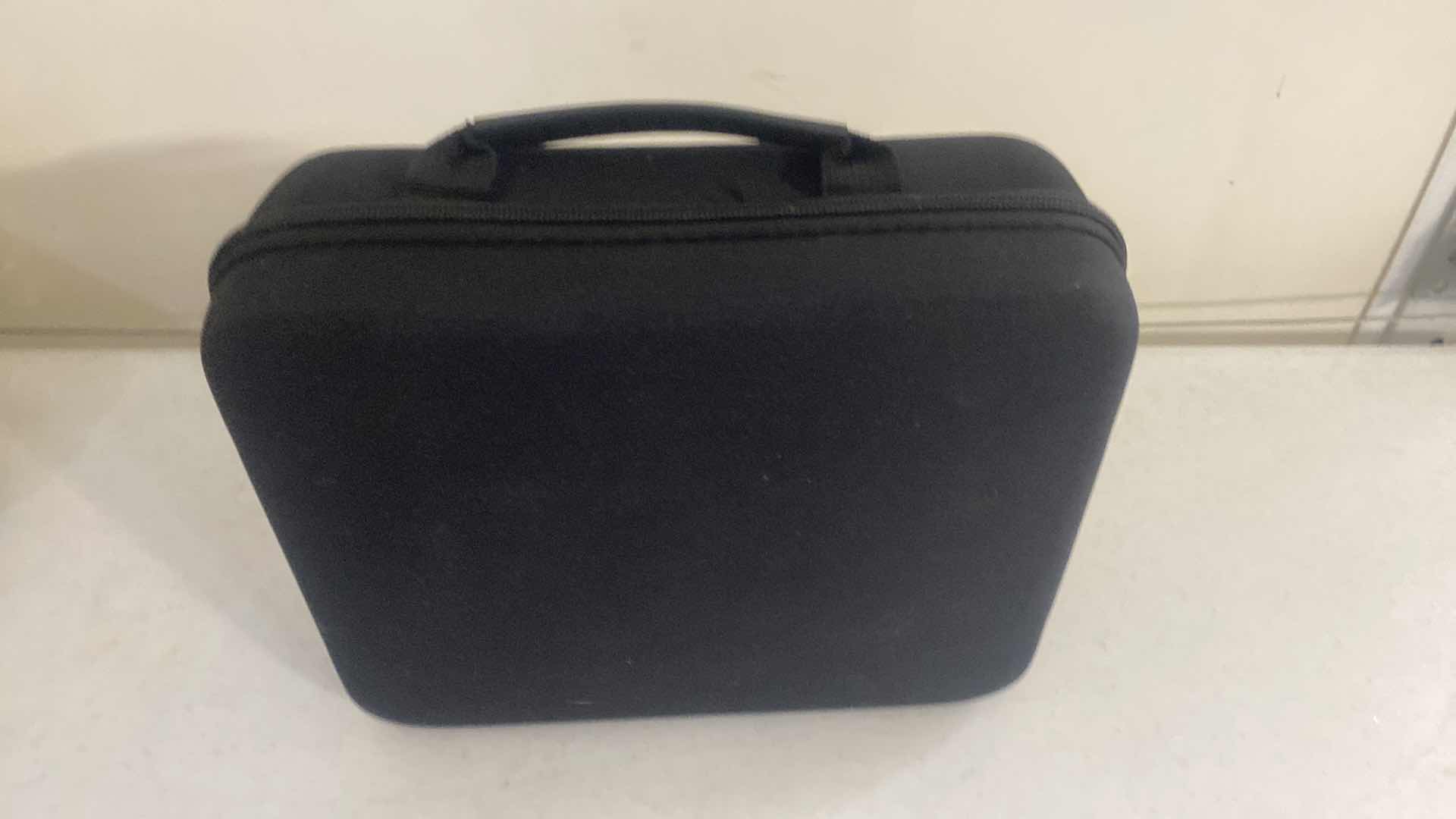 Photo 1 of NEW MASSAGE GUN WITH CASE