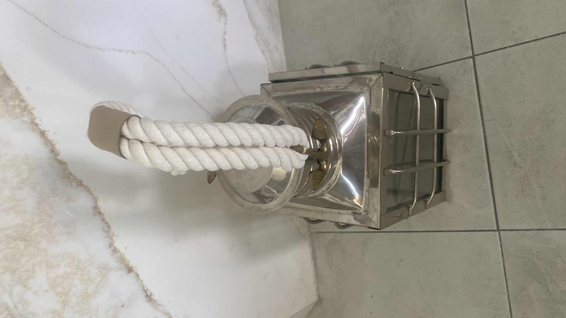 Photo 1 of ADMIRAL COVE HEAVY METAL & GLASS POLISHED CHROME LANTERN WITH ROPE TO HANG OR USE TABLE TOP 9” X 23 1/2”