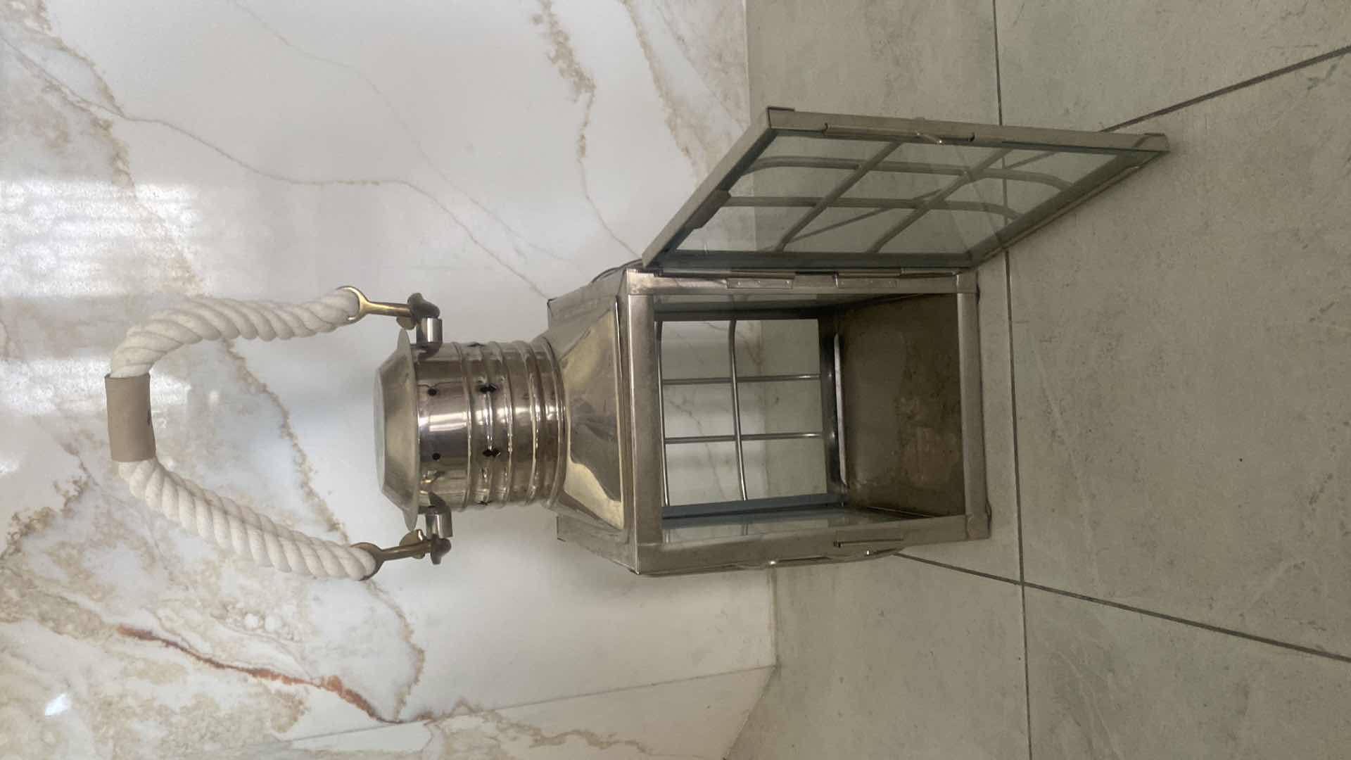 Photo 1 of ADMIRAL COVE HEAVY METAL & GLASS POLISHED CHROME LANTERN WITH ROPE TO HANG OR USE TABLE TOP 9” X 23 1/2”