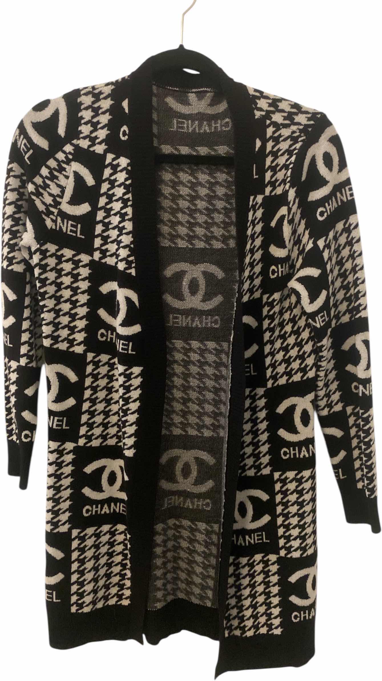 Photo 1 of WOMENS REPLICA CHANEL SWEATER SIZE MEDIUM