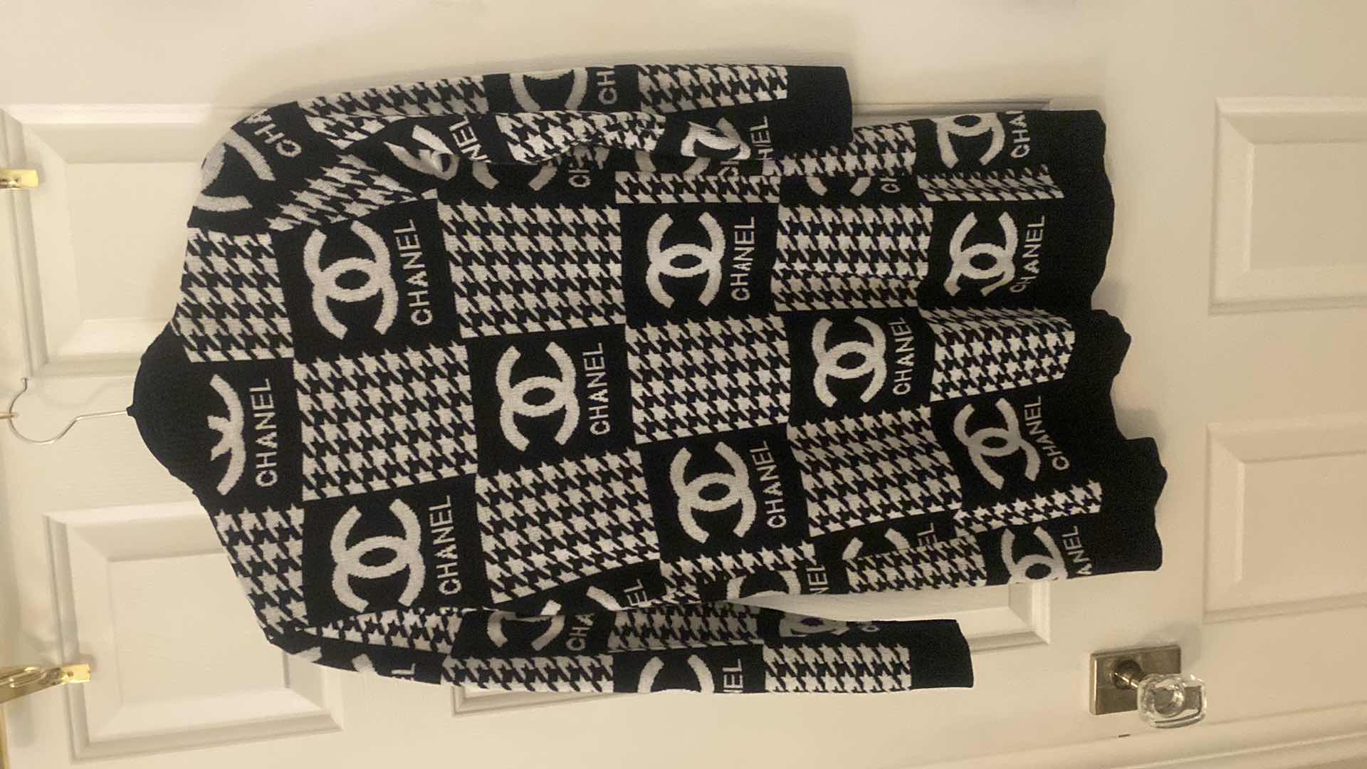 Photo 1 of WOMENS REPLICA CHANEL SWEATER SIZE MEDIUM