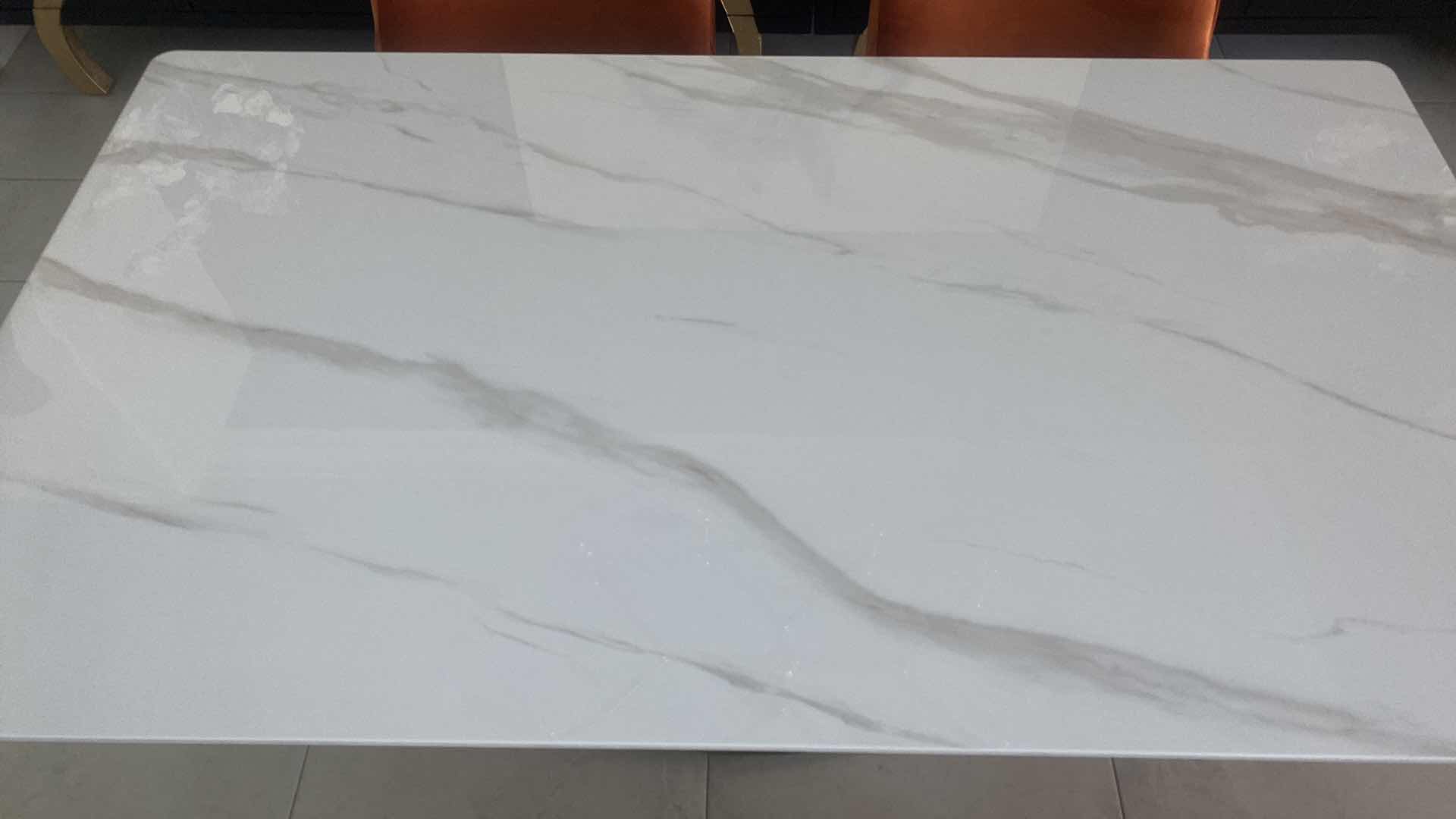 Photo 1 of LESLE RECTANGULAR SINTERED STONE TOP DINING TABLE WITH GOLD X-BASE BY ORREN ELLIS 29 1/2” X 63” H 30” (CHAIRS NOT INCLUDED)