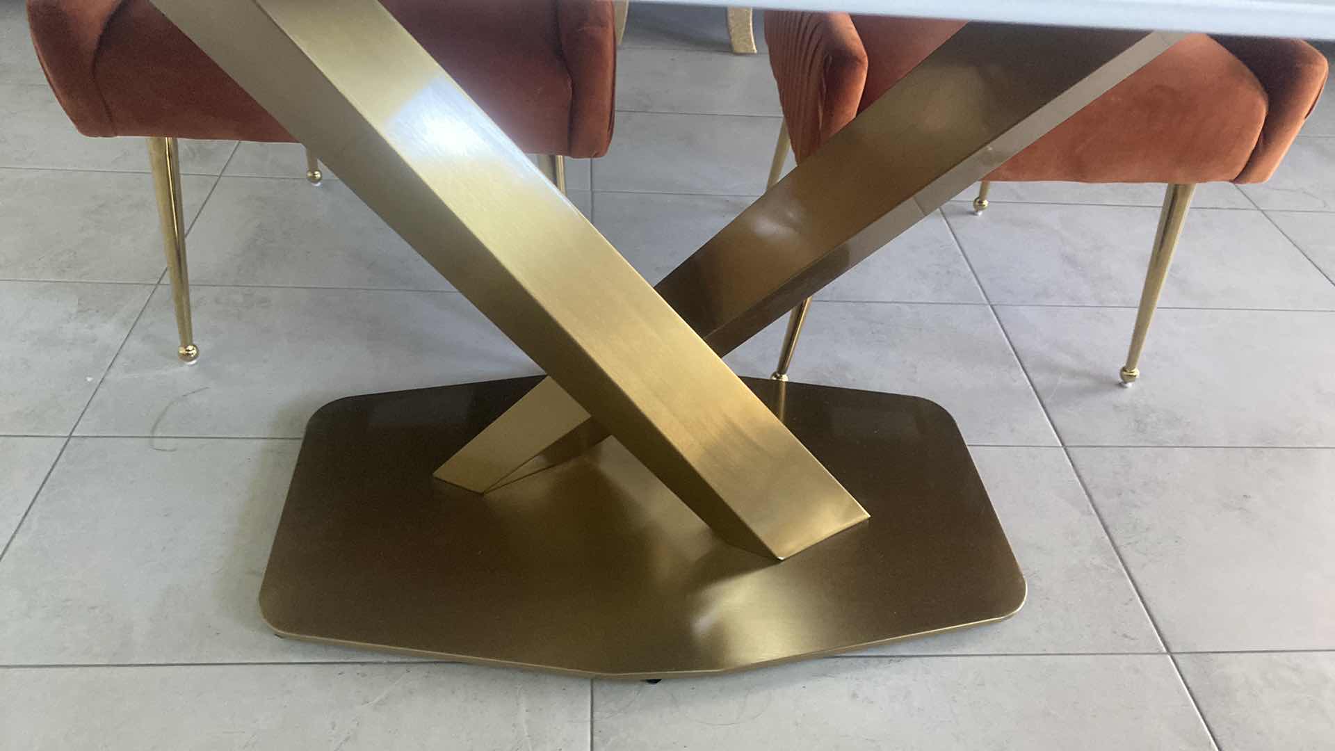 Photo 1 of LESLE RECTANGULAR SINTERED STONE TOP DINING TABLE WITH GOLD X-BASE BY ORREN ELLIS 29 1/2” X 63” H 30” (CHAIRS NOT INCLUDED)