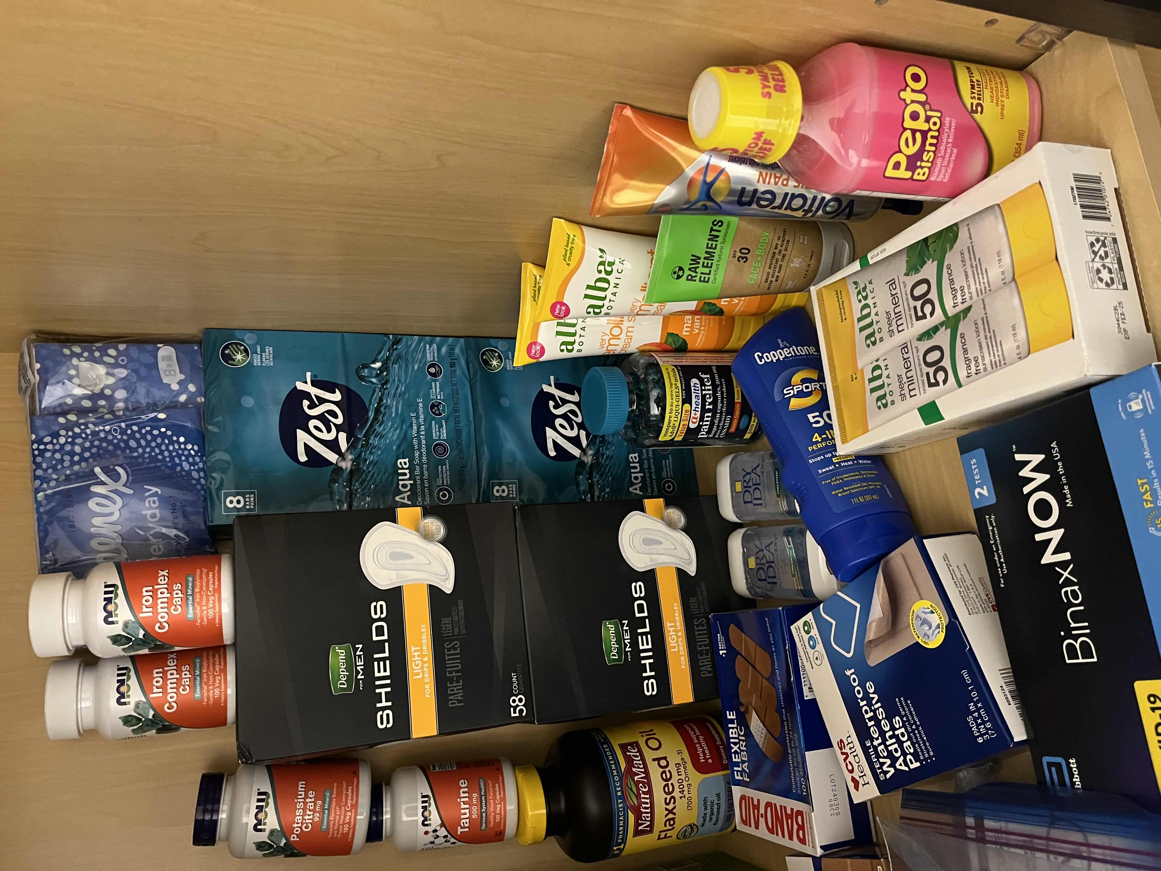 Photo 1 of NEW CONTENTS OF CABINET-HYGIENE PRODUCTS, FIRST AID, SUPPLEMENTS