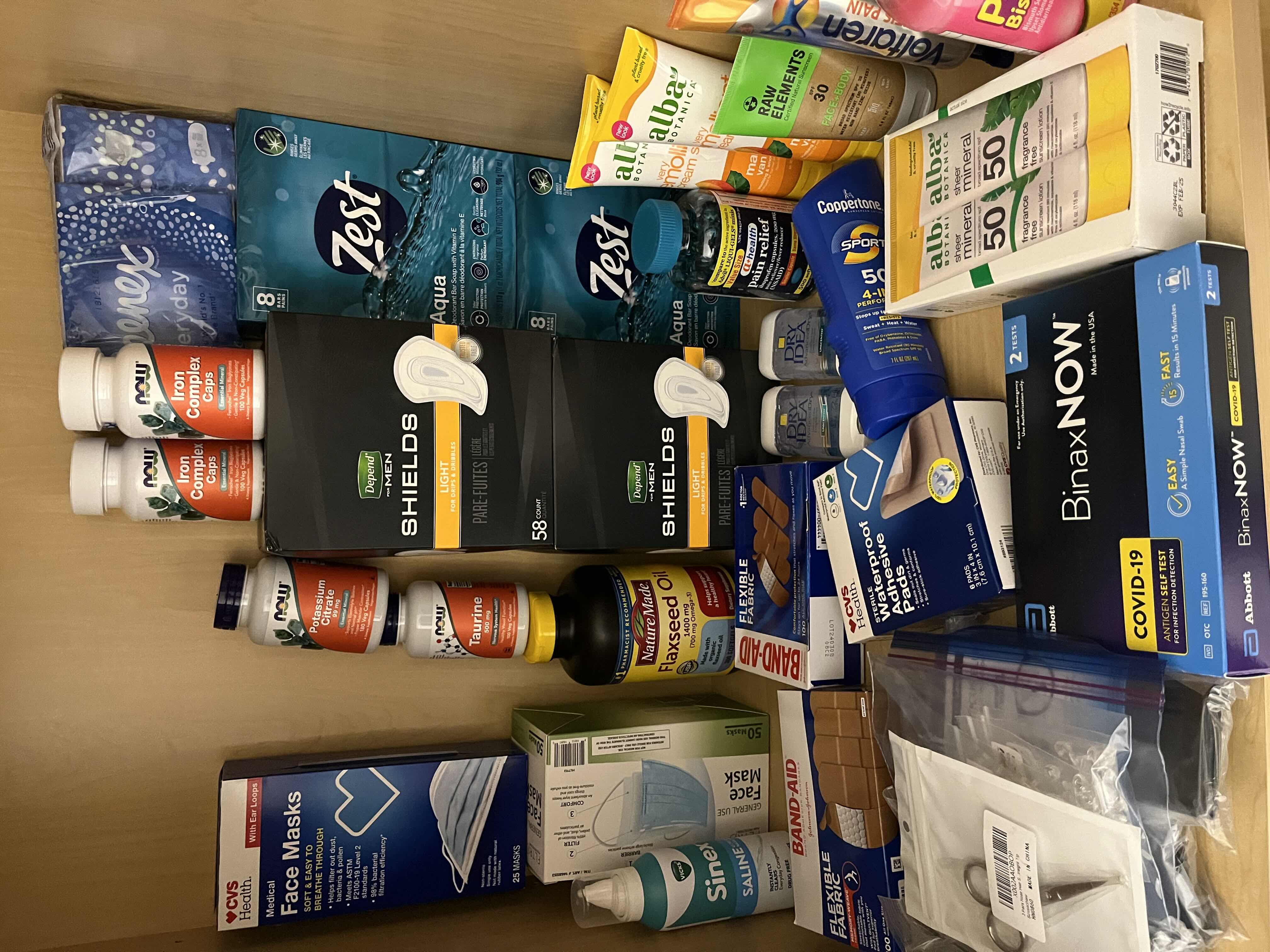 Photo 1 of NEW CONTENTS OF CABINET-HYGIENE PRODUCTS, FIRST AID, SUPPLEMENTS