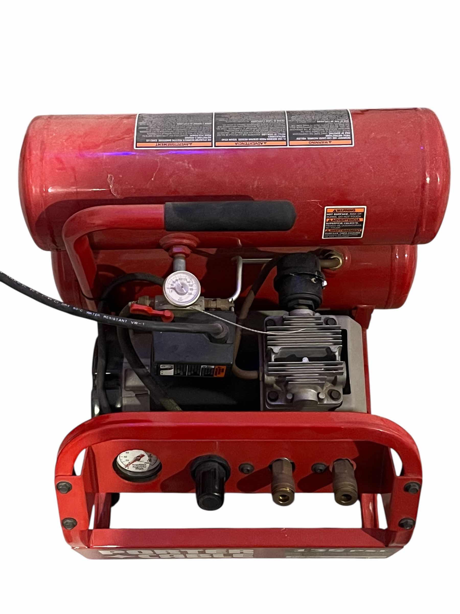 Photo 1 of PORTER CABLE 135PSI OIL-FREE 4GAL AIR COMPRESSOR W EXTRA HOSES & ATTACHMENT