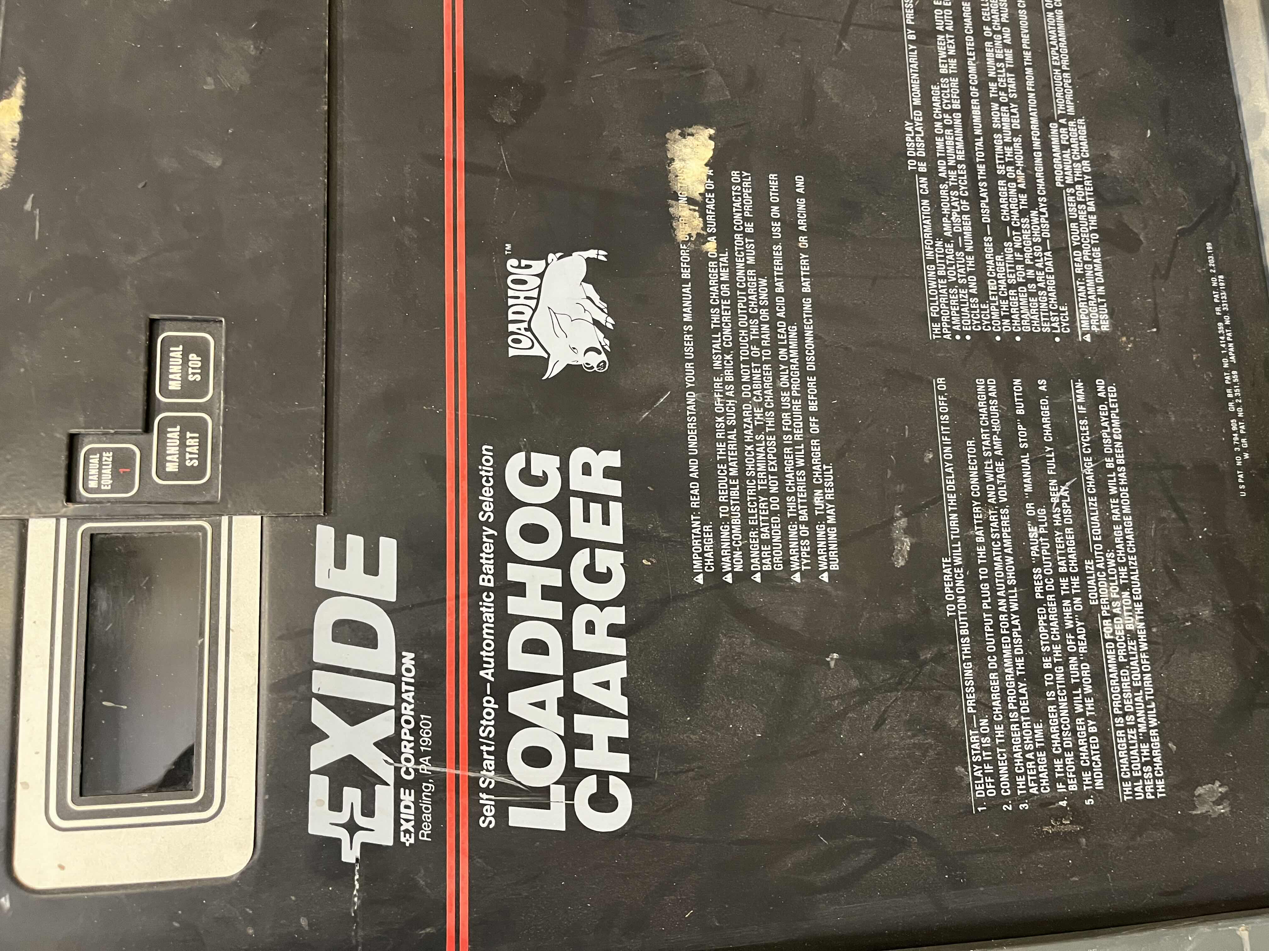 Photo 1 of HYSTER ELECTRIC STAND UP LIFT TRUCK FORKLIFT MODEL N40FR YR.2000 & EXIDE LOAD HOG FORKLIFT CHARGER MODEL LH1-12-850 (READ NOTES)