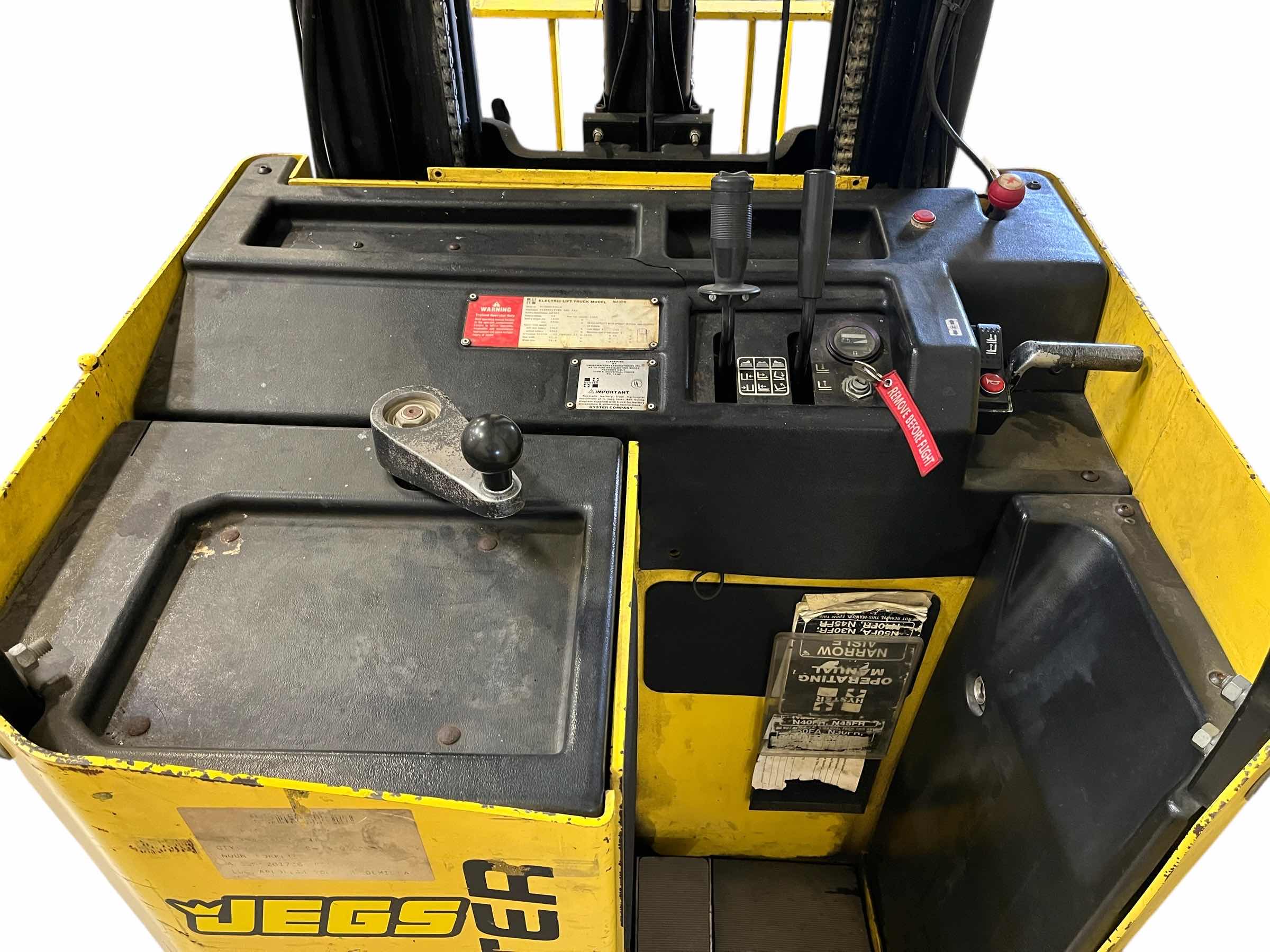 Photo 1 of HYSTER ELECTRIC STAND UP LIFT TRUCK FORKLIFT MODEL N40FR YR.2000 & EXIDE LOAD HOG FORKLIFT CHARGER MODEL LH1-12-850 (READ NOTES)