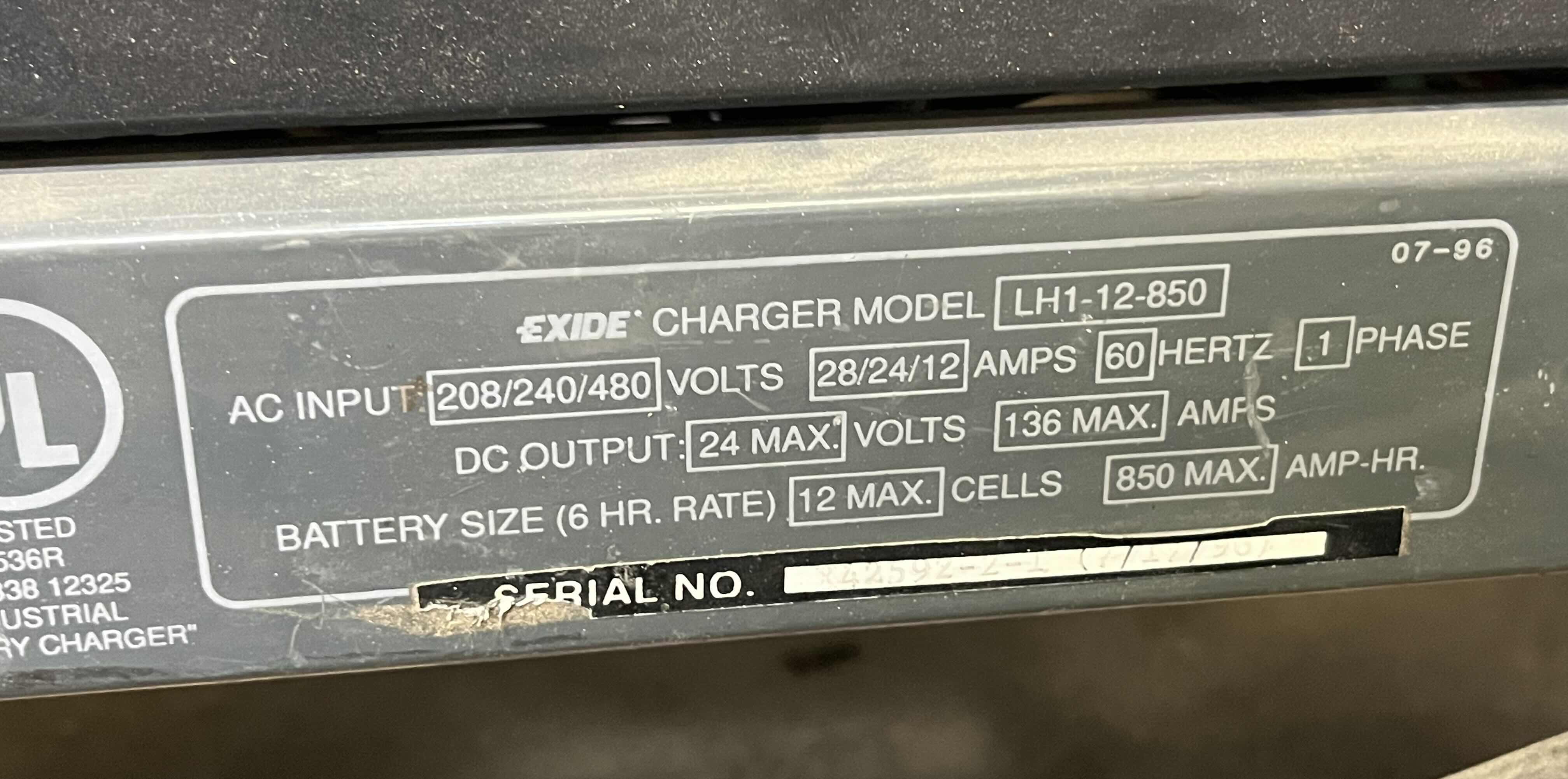 Photo 1 of HYSTER ELECTRIC STAND UP LIFT TRUCK FORKLIFT MODEL N40FR YR.2000 & EXIDE LOAD HOG FORKLIFT CHARGER MODEL LH1-12-850 (READ NOTES)