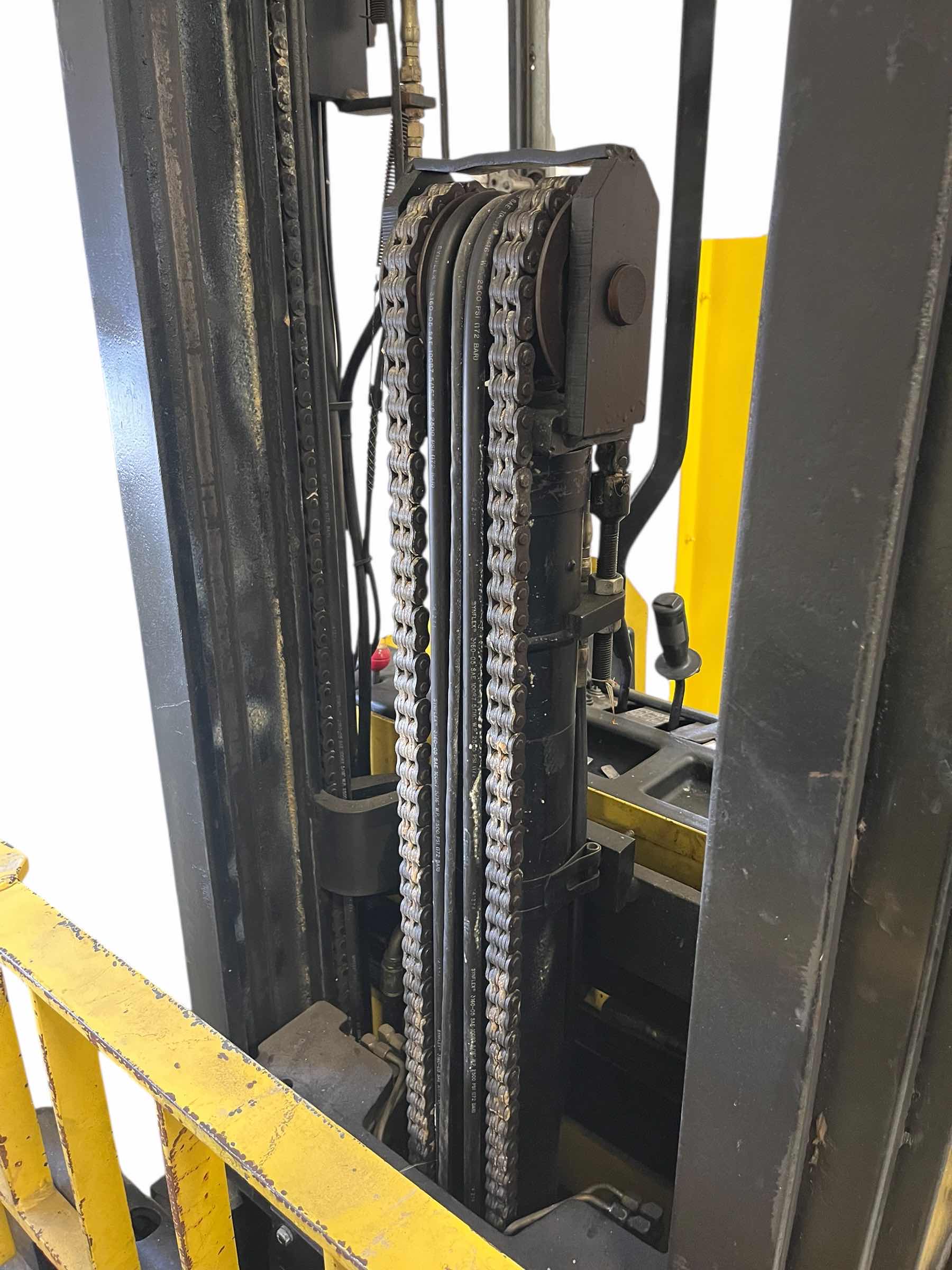 Photo 1 of HYSTER ELECTRIC STAND UP LIFT TRUCK FORKLIFT MODEL N40FR YR.2000 & EXIDE LOAD HOG FORKLIFT CHARGER MODEL LH1-12-850 (READ NOTES)