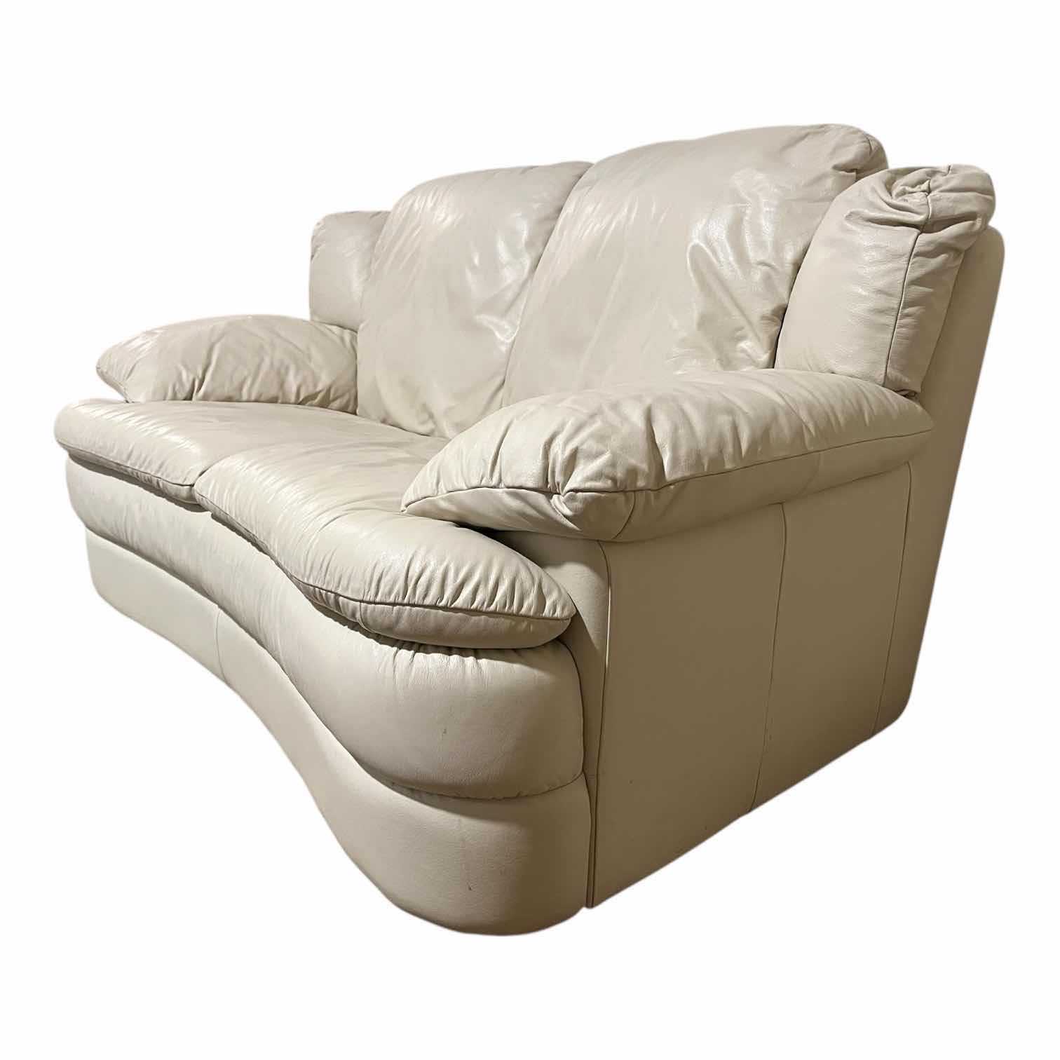 Photo 1 of ACTION INDUSTRIES OFF-WHITE LEATHER LOVESEAT W 2 THROW PILLOWS 69” X 38” H34”