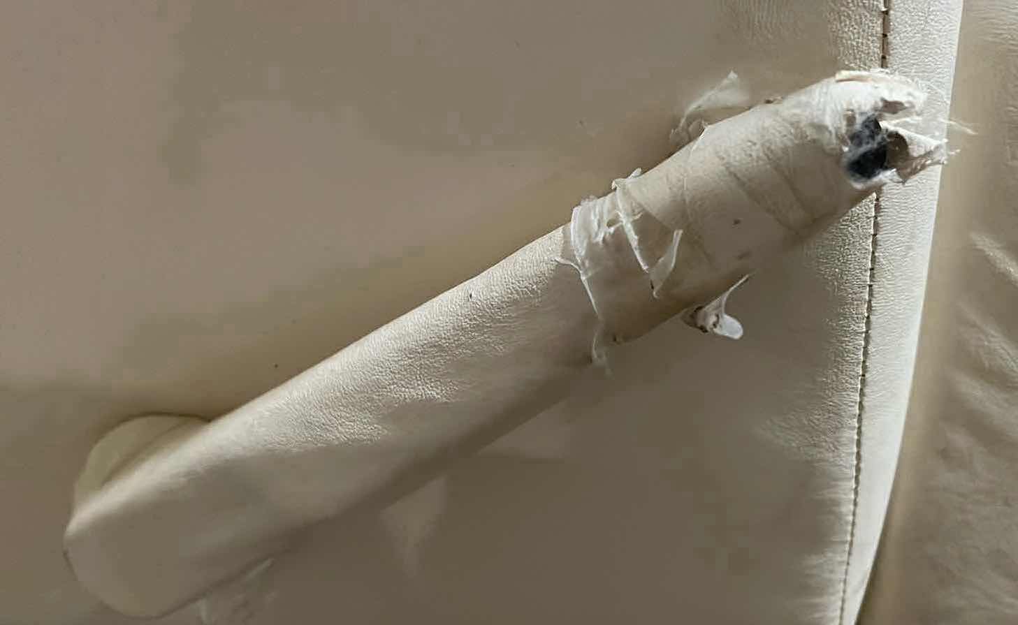 Photo 1 of ACTION INDUSTRIES OFF-WHITE LEATHER RECLINER CHAIR 40” X 45” H39”