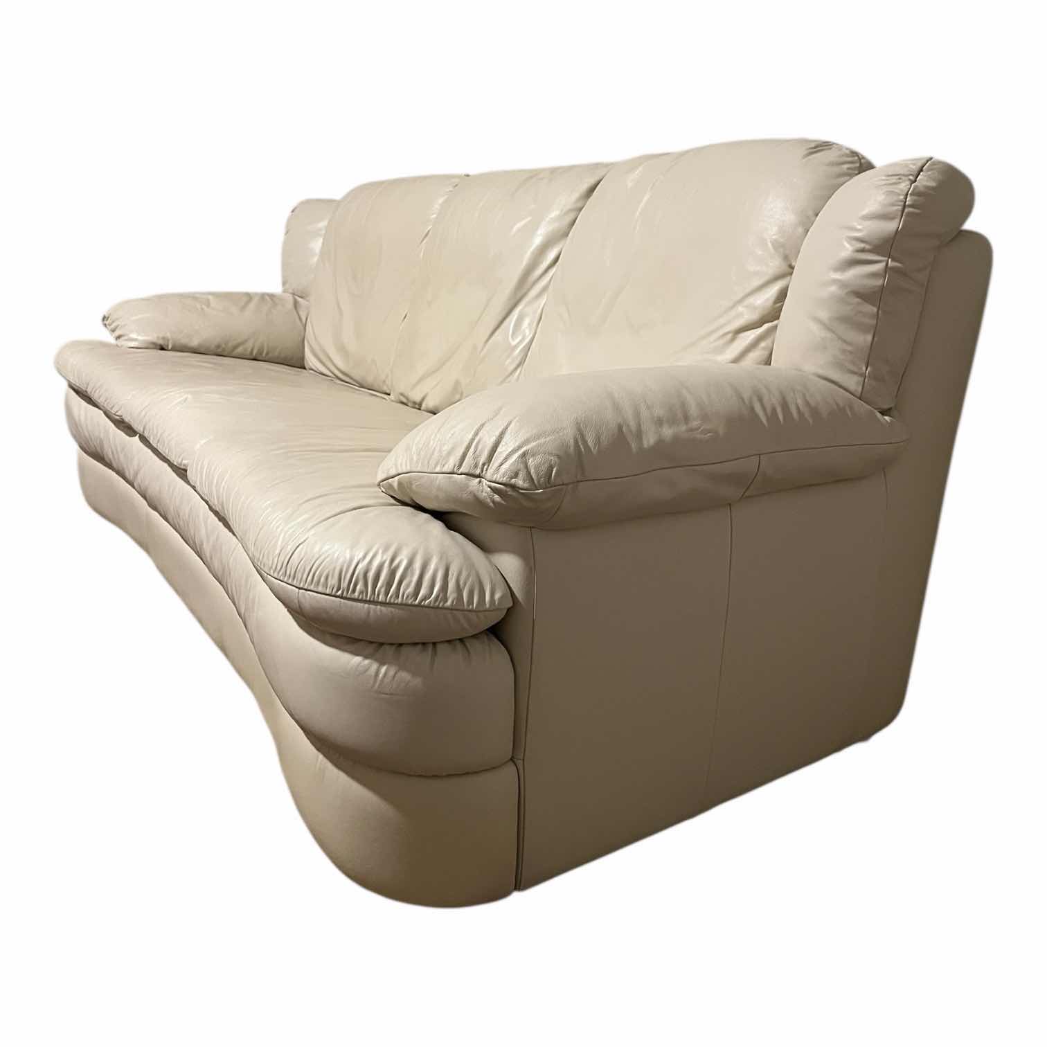 Photo 1 of ACTION INDUSTRIES OFF-WHITE LEATHER SOFA W 2 THROW PILLOWS 92” X 38” H33”