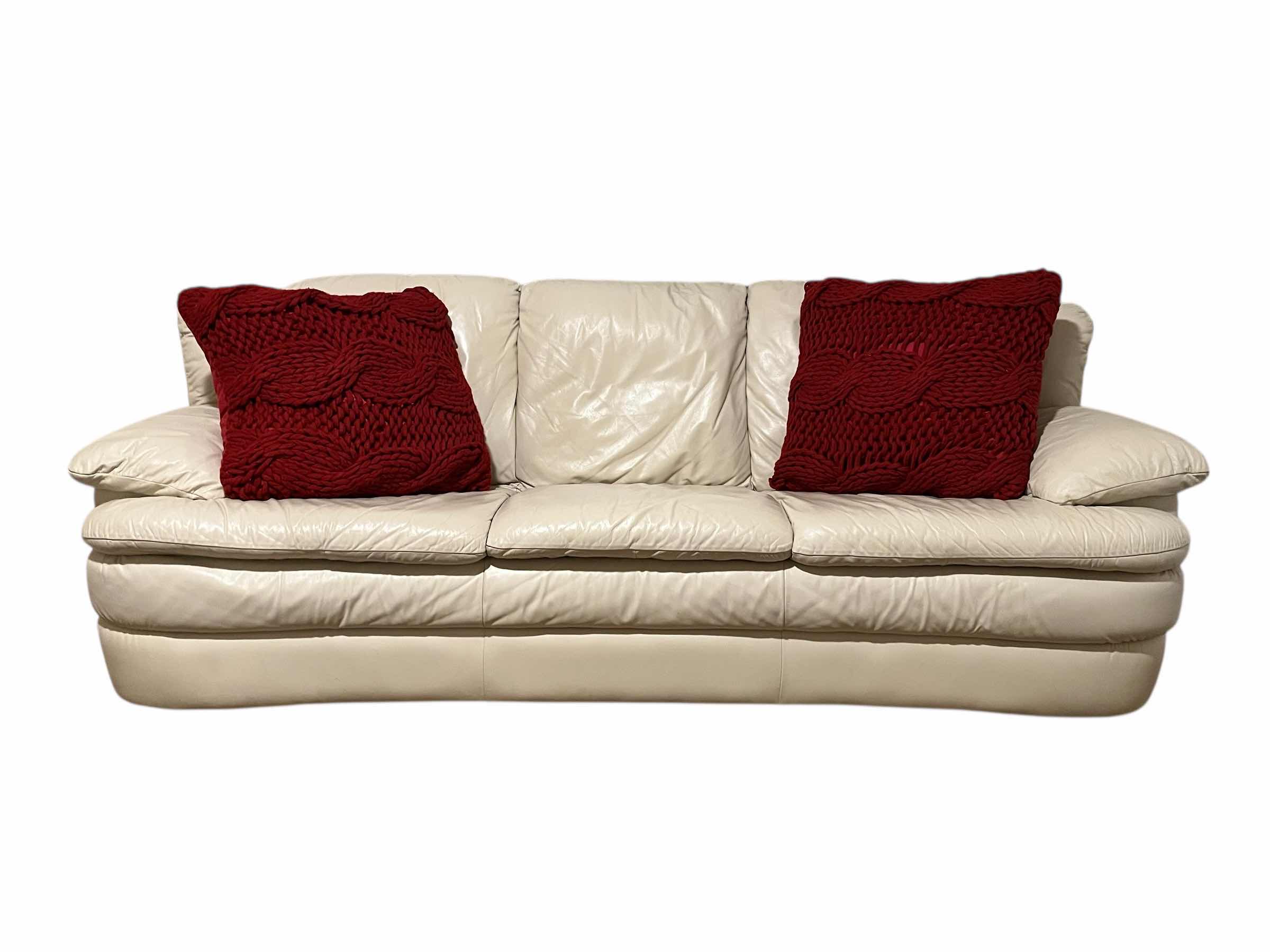 Photo 1 of ACTION INDUSTRIES OFF-WHITE LEATHER SOFA W 2 THROW PILLOWS 92” X 38” H33”