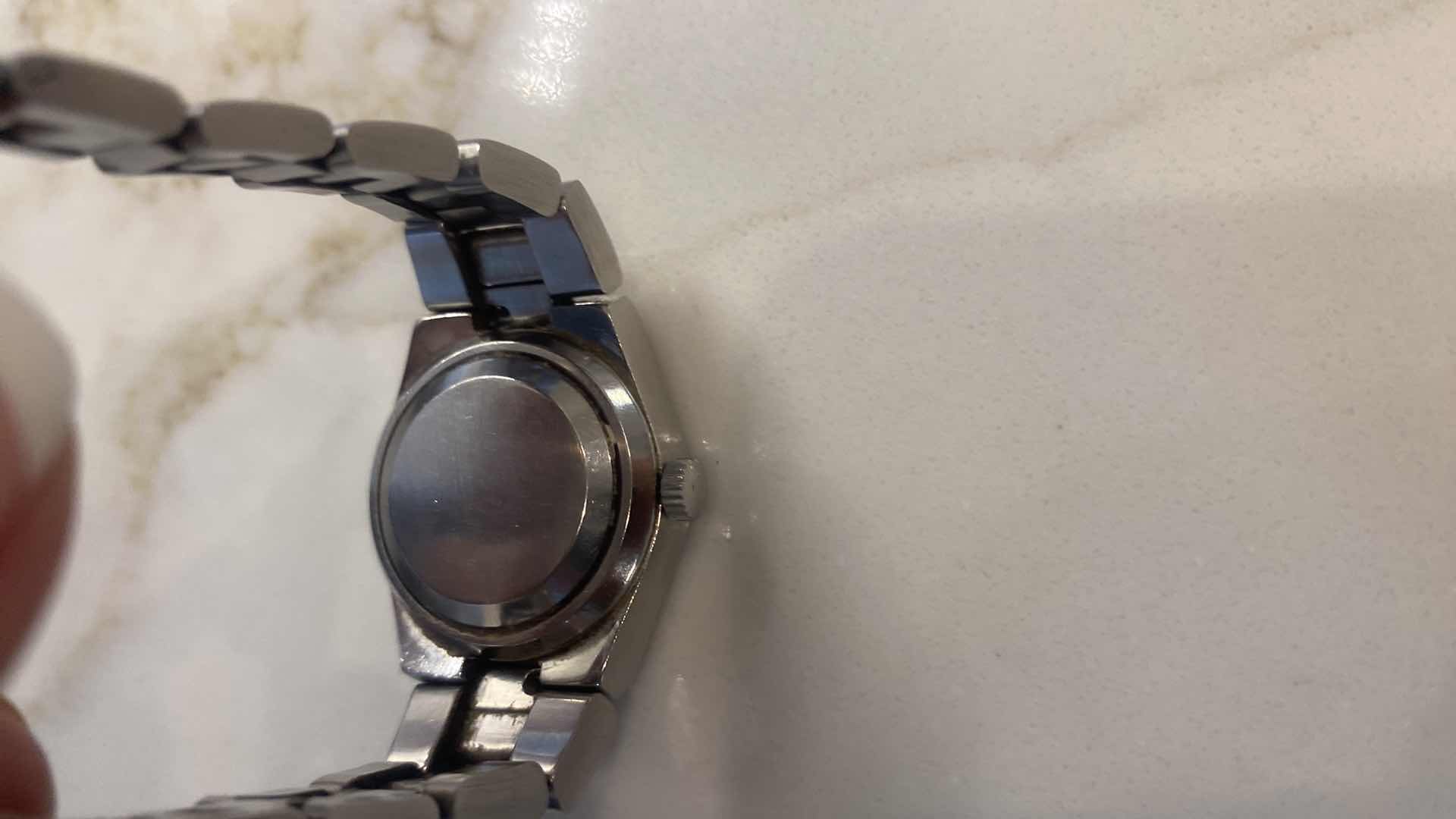 Photo 1 of VINTAGE WOMEN’S OMEGA SEA MASTER COSMIC 2000 AUTOMATIC WRISTWATCH WITH STAINLESS STEEL TONNEAU SHAPED CASE, SILVER CHAMPAGNE, DIAL WITH STICK MARKERS AND DATE WINDOW JEWELRY