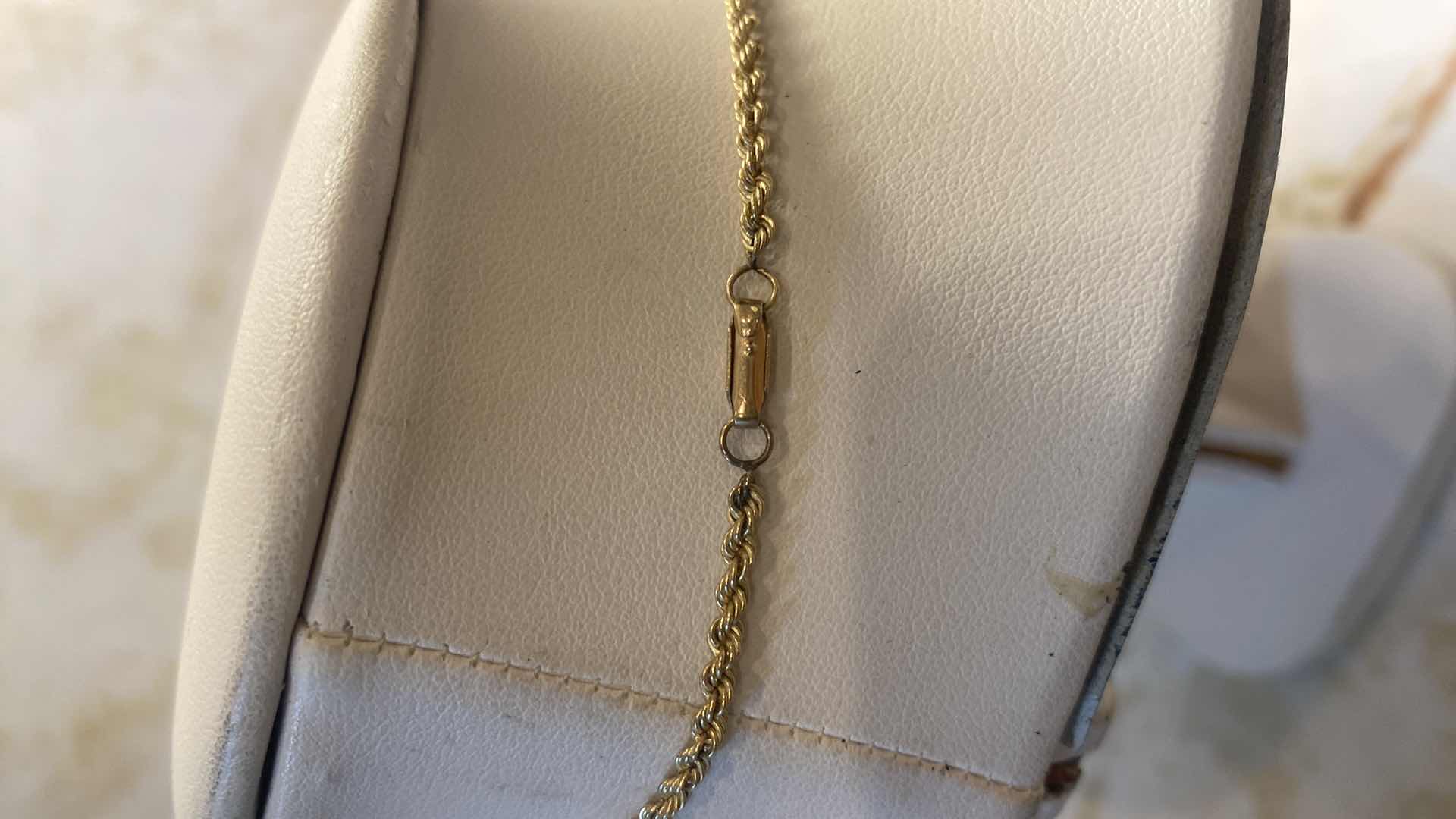 Photo 1 of WOMEN’S10K GOLD STAMPED CHAIN WITH CRUCIFIX PENDANT STAMPED 10K, 1 1/2 INCHES DROP JEWELRY