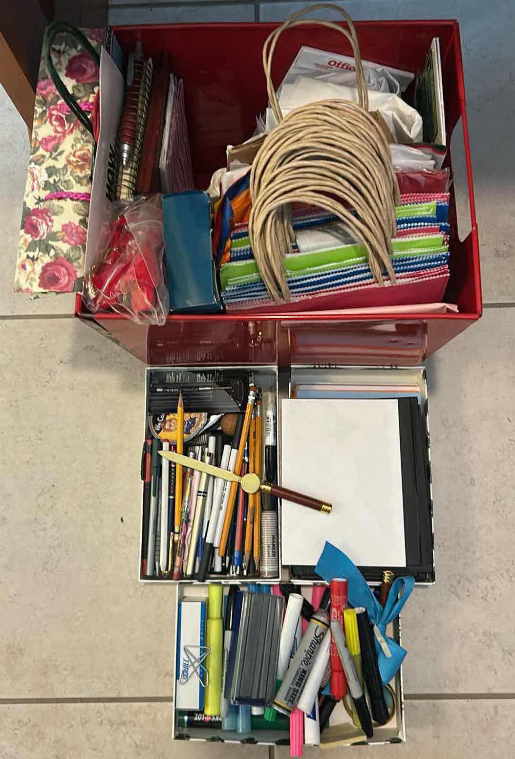 View 1 of CONTENTS OF RED TOTE ASSORTED GIFT BAGS PENCILS
