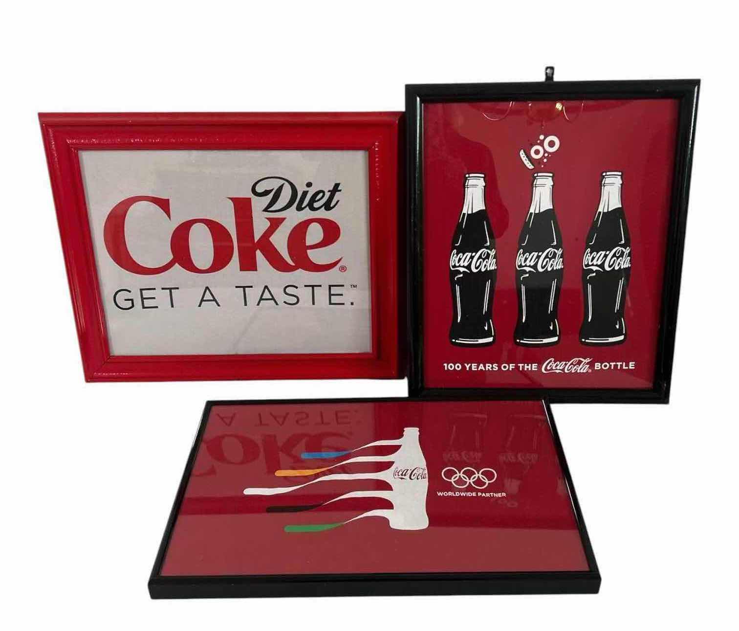 View 1 of COLLECTABLE 3 VINTAGE COMMEMORATIVE COCA COLA ADVERTISING FRAMED T SHIRTS