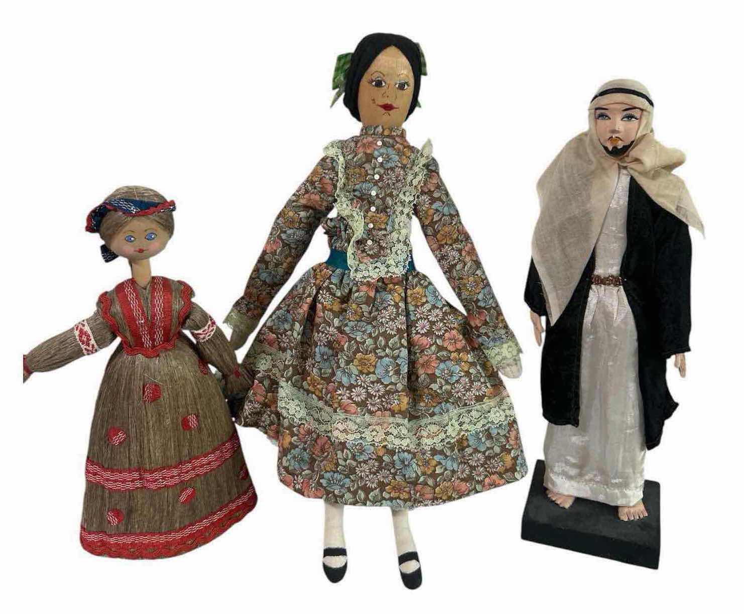 View 1 of 3- VINTAGE CULTURAL DOLLS W DISTINCT HANDCRAFTED TRADITIONAL CLOTHING H 14" 12" 10"