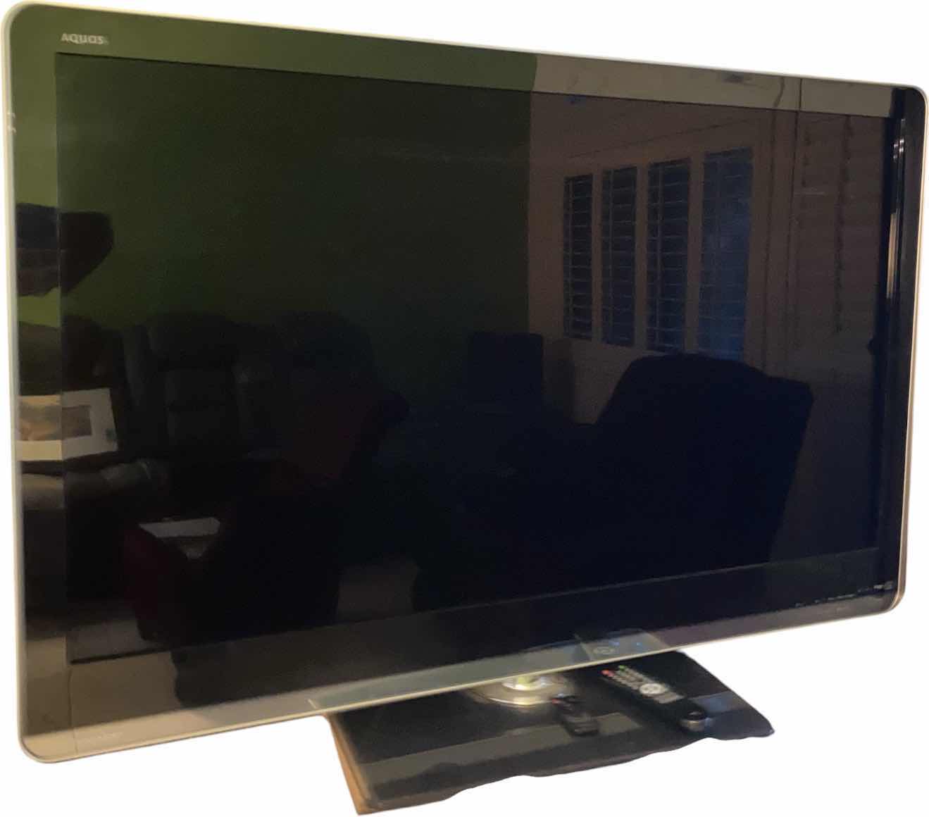 View 1 of 52” SHARP AQUOS MODEL LC DASH 52LE810UN ON SWIVEL STAND (REMOTE MISSING)