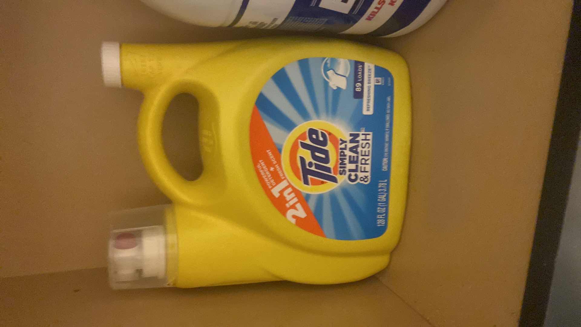 View 3 of CONTENTS OF CABINET-LAUNDRY SUPPLIES AND KITCHEN STAPLES ONE TIDE IS FULL
