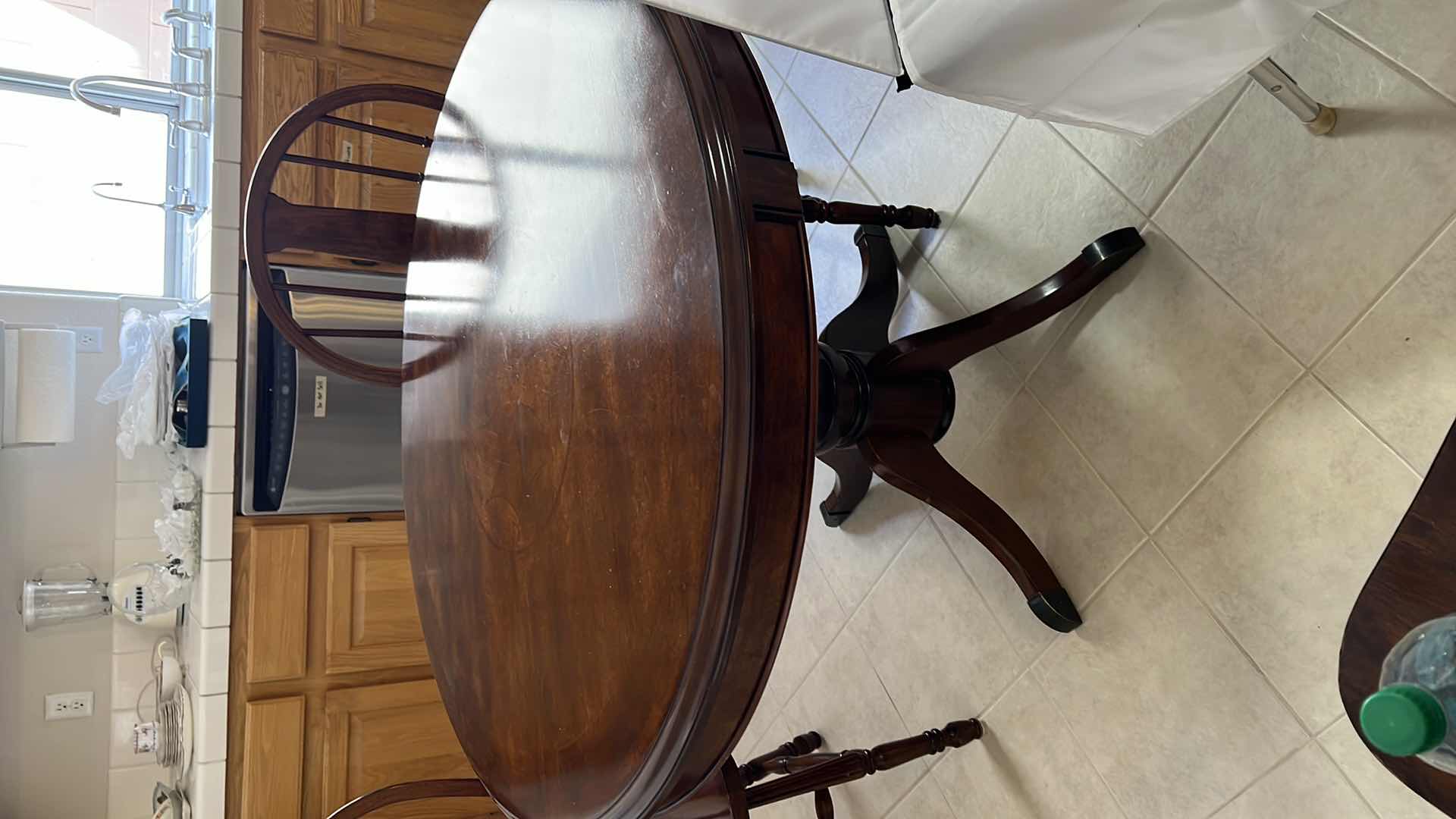 Photo 1 of WODDEN TABLE AND CHAIR SET. 43”D X 32” H. WITH 5 CHAIRS