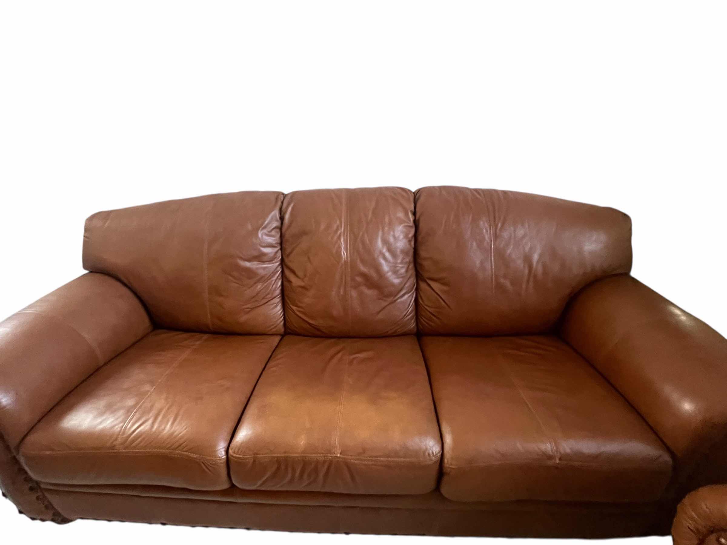 Photo 1 of 82”OVER STUFFED GENUINE LEATHER COUCH. PART OF MATCHING LIVING ROOM SET OF 3 PIECES (CHAIR AND LOVE SEAT SOLD SEPARATLEY)