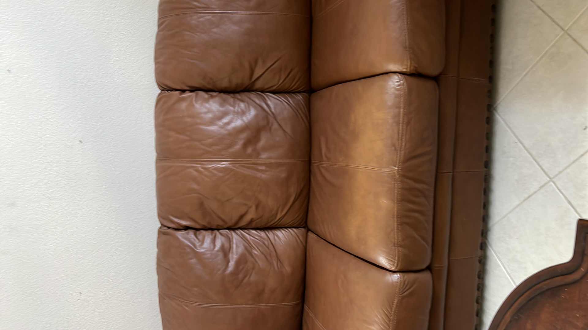 Photo 1 of 82”OVER STUFFED GENUINE LEATHER COUCH. PART OF MATCHING LIVING ROOM SET OF 3 PIECES (CHAIR AND LOVE SEAT SOLD SEPARATLEY)