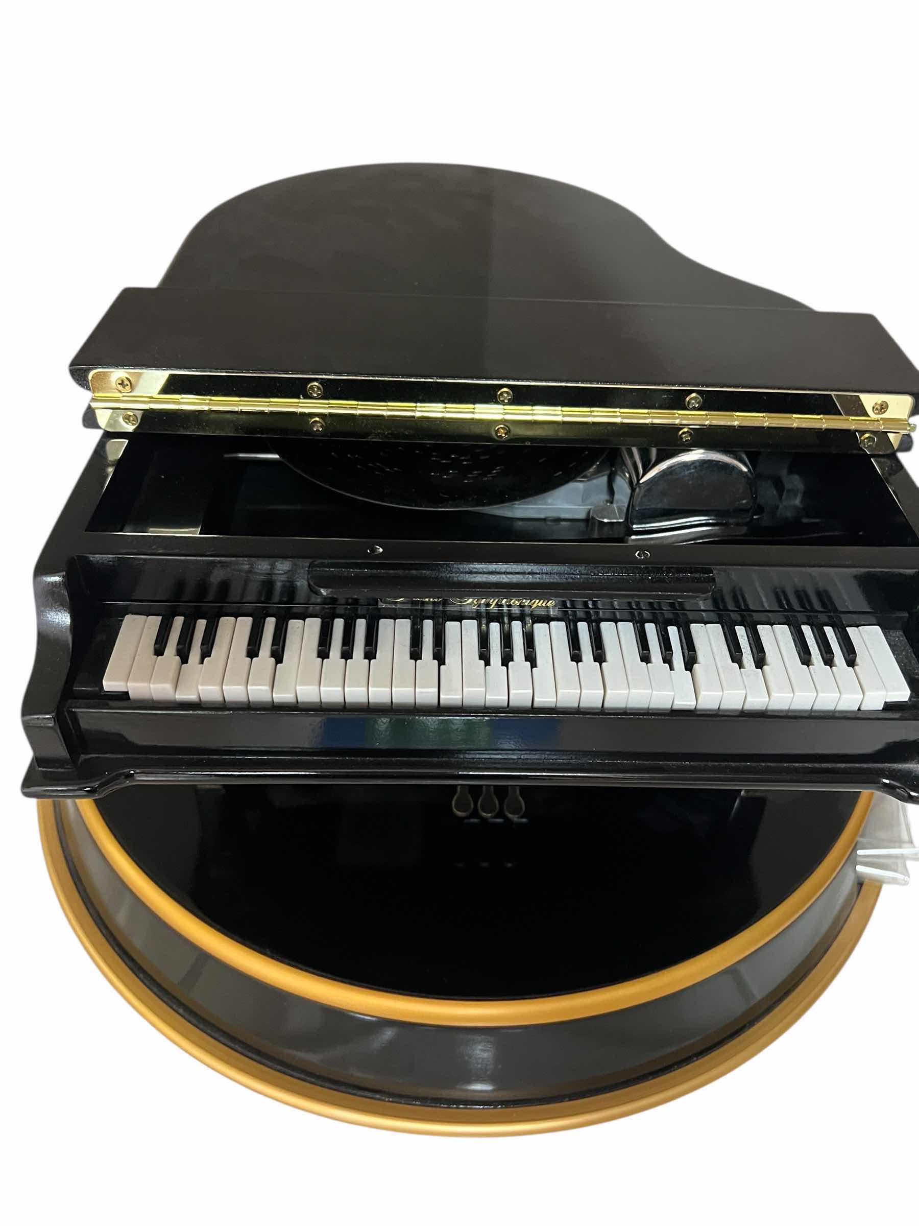 Photo 1 of DECORATIVE MUSIC BOX PIANO. 12”X8”H. PLAYS SEVERAL CHRISTMAS SONGS. BEAUTIFUL COLLECTIBLE.