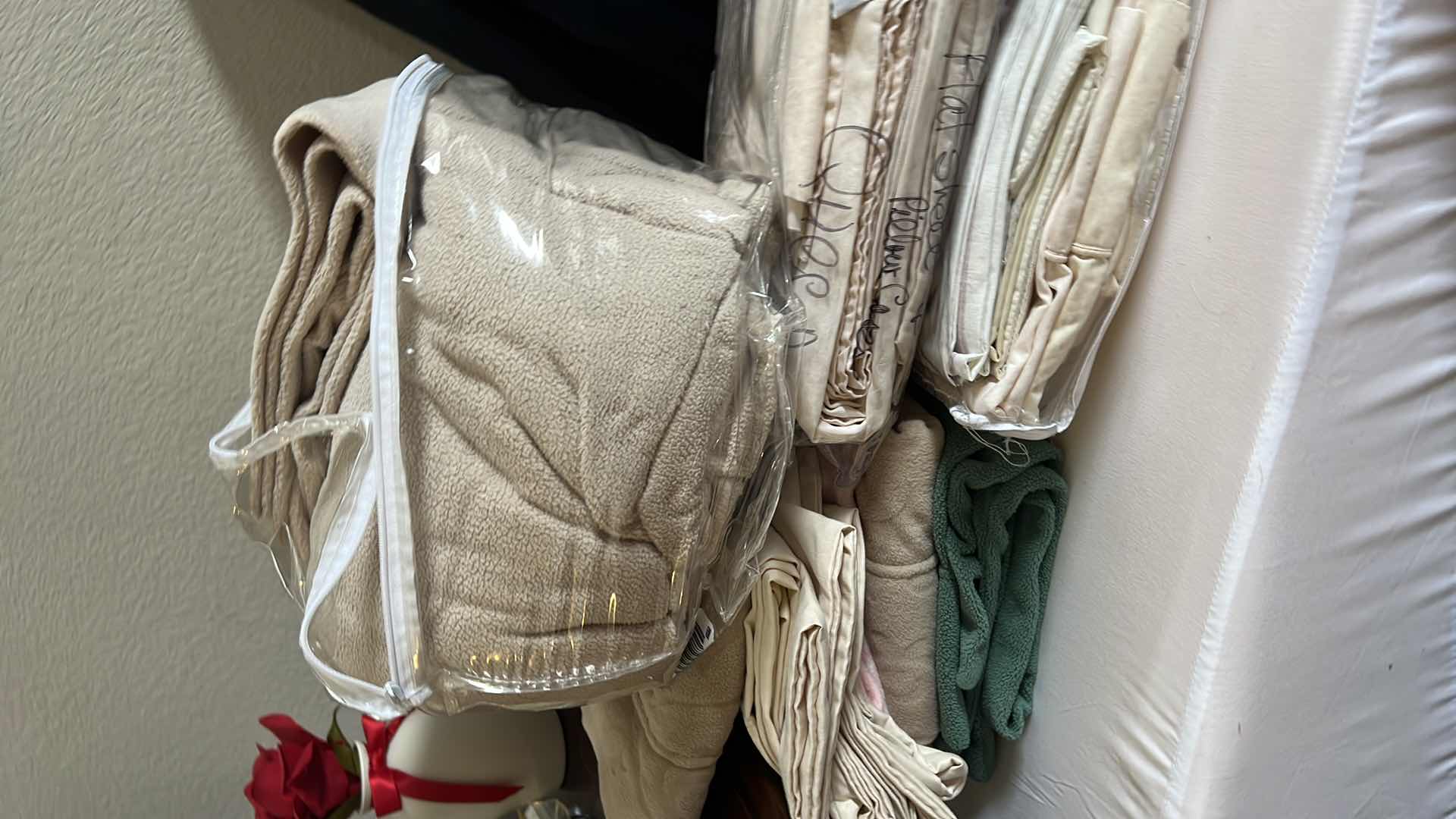 Photo 1 of ASSORTED BLANKETS-CONTENTS OF LINEN CABINET.