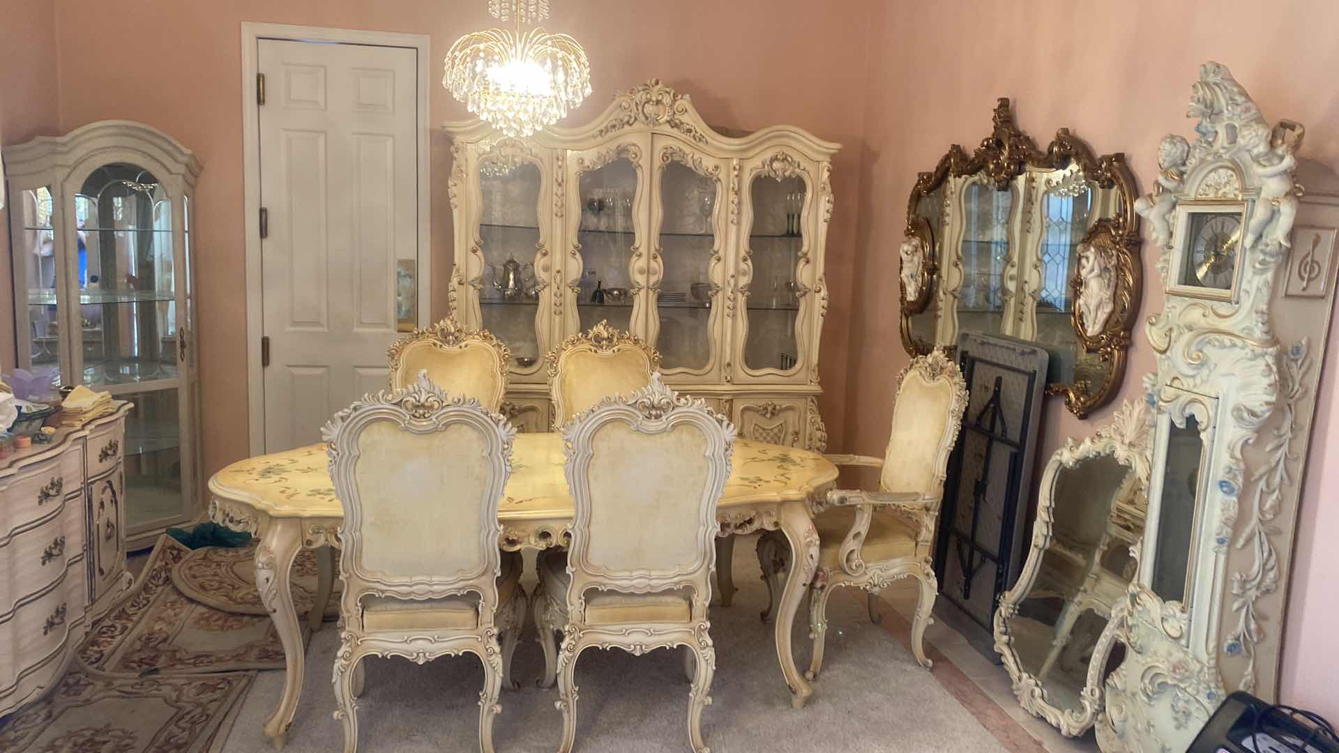 Photo 1 of FRENCH PROVINCIAL HAND PAINTED DINING TABLE W 4
ARMLESS CHAIRS & 1 ARM CHAIR MEASURES WITHOUT LEAF 67“ x 43“ H 29 3/4” LEAF 18”