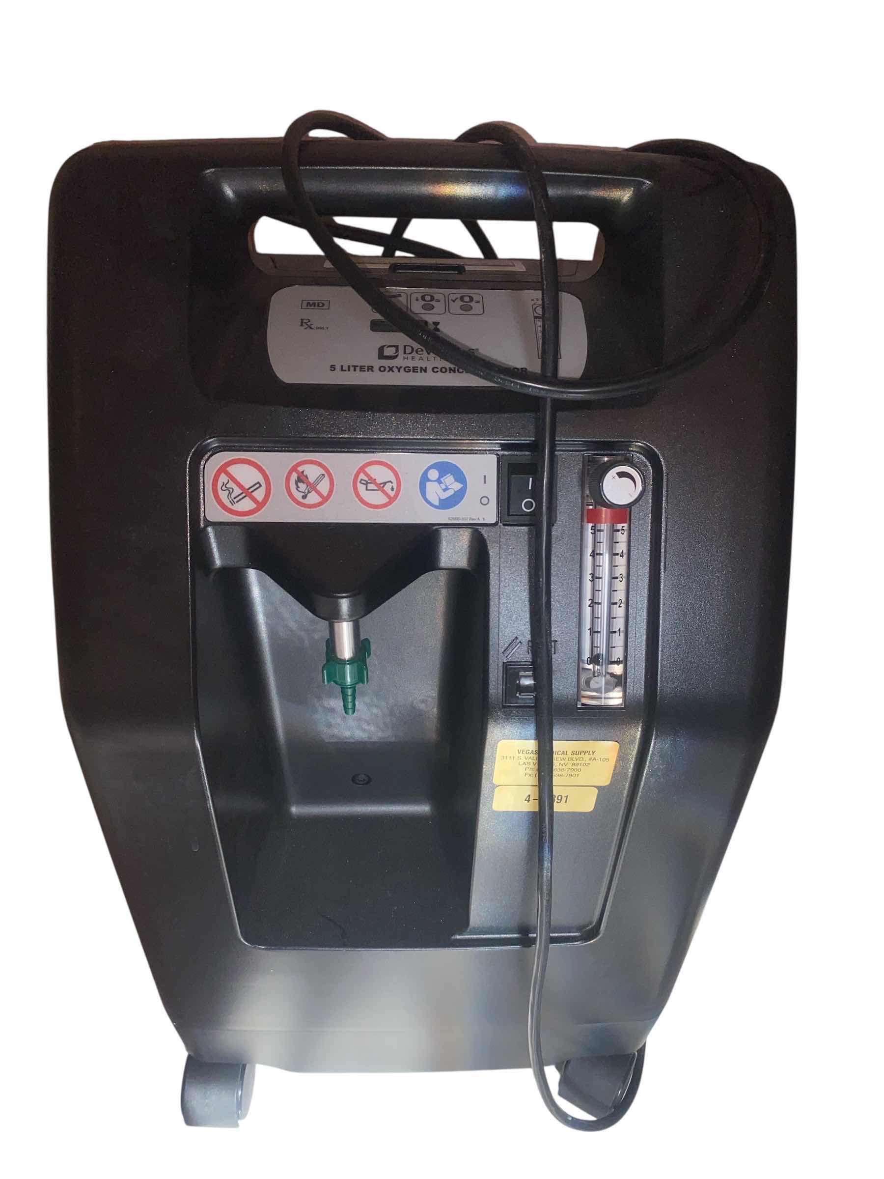 Photo 1 of DE VILBISD 5 LITER OXYGEN CONCENTRATOR