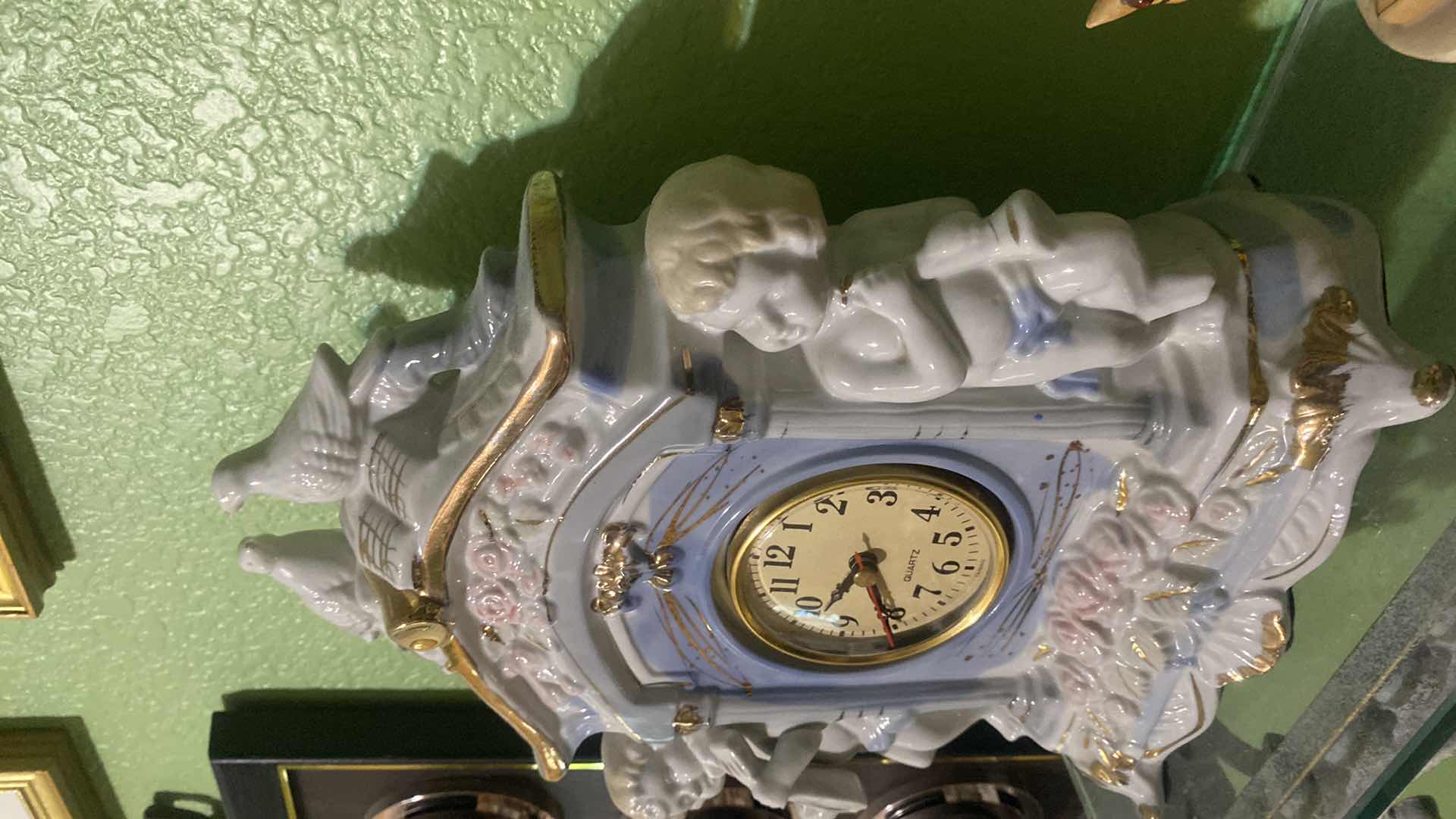 Photo 1 of PORCELAIN BATTERY OPERATED MANTLE CLOCK 9 1/2” x 11 1/2”