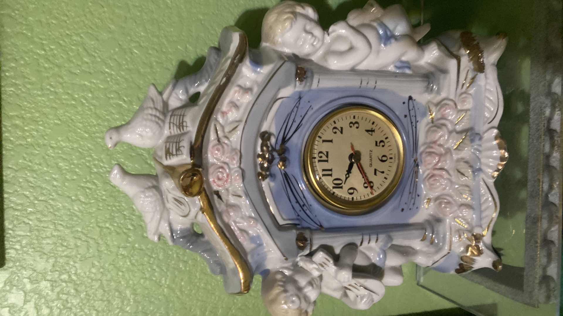 Photo 1 of PORCELAIN BATTERY OPERATED MANTLE CLOCK 9 1/2” x 11 1/2”