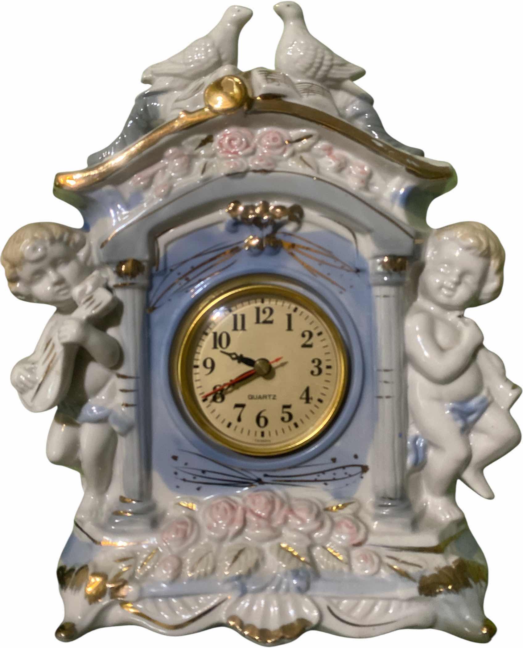 Photo 1 of PORCELAIN BATTERY OPERATED MANTLE CLOCK 9 1/2” x 11 1/2”