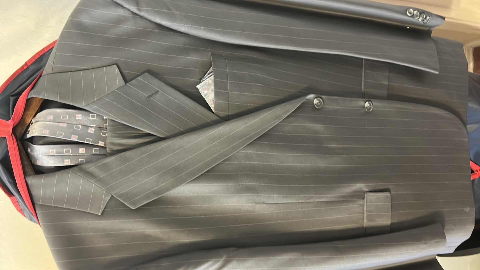 Photo 1 of MENS SUIT WITH TIE AND ZIPPER BAG SLACKS 48” x 46”