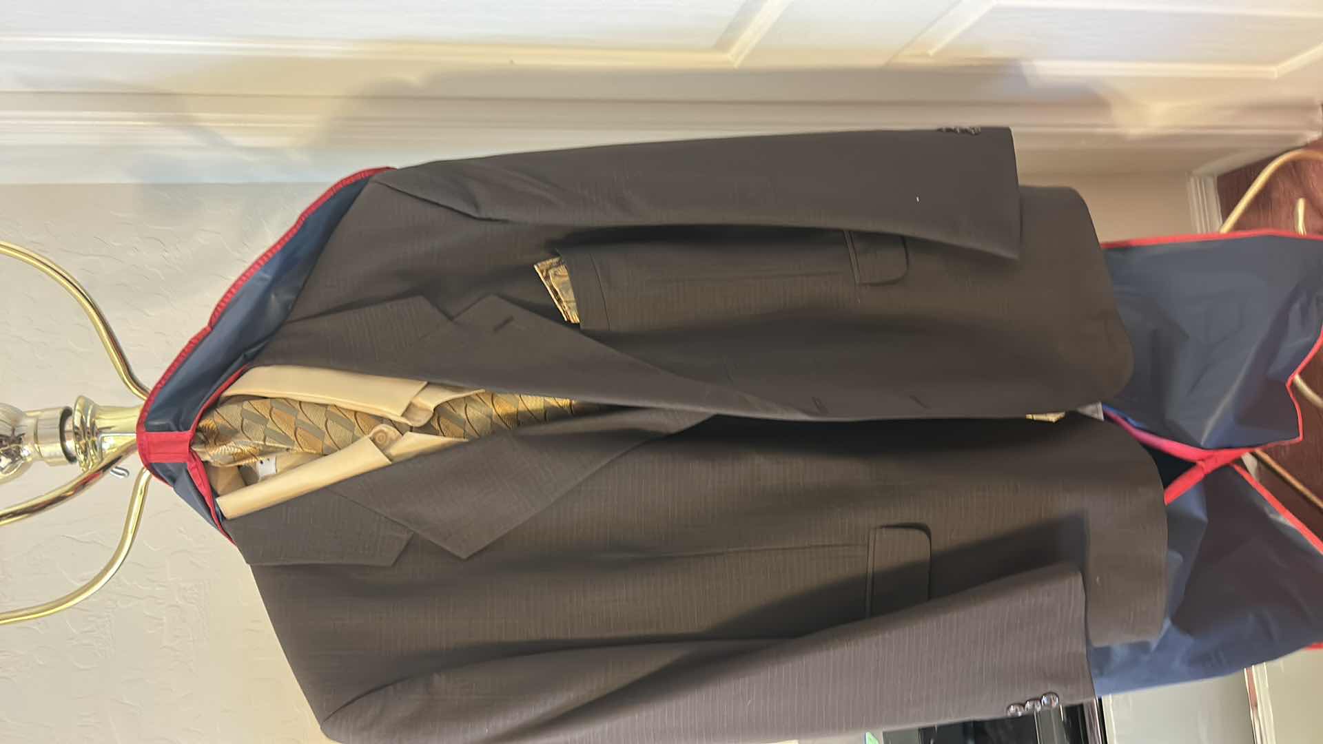 Photo 1 of MENS SUIT, SHIRT AND TIE IN ZIPPER BAG SLACKS WAIST 46”