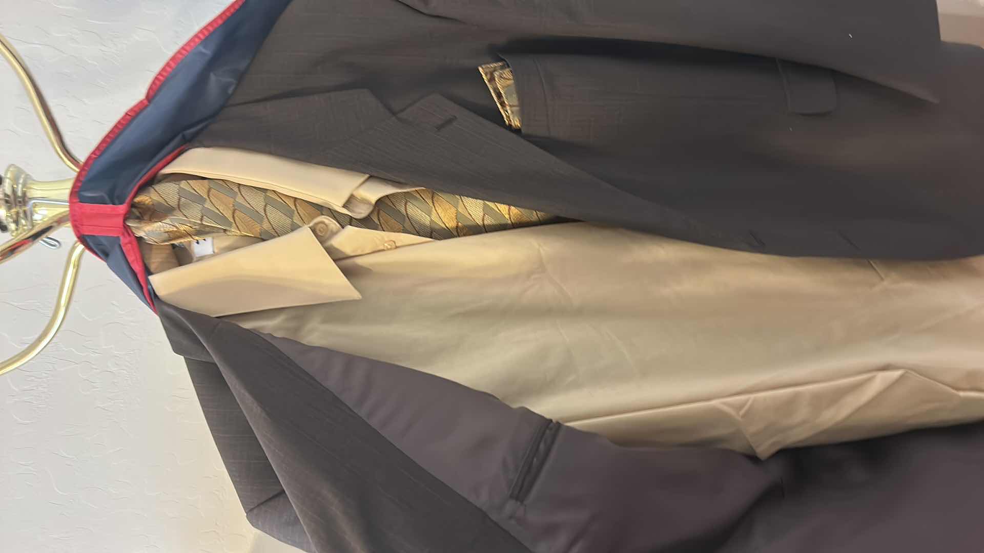 Photo 1 of MENS SUIT, SHIRT AND TIE IN ZIPPER BAG SLACKS WAIST 46”