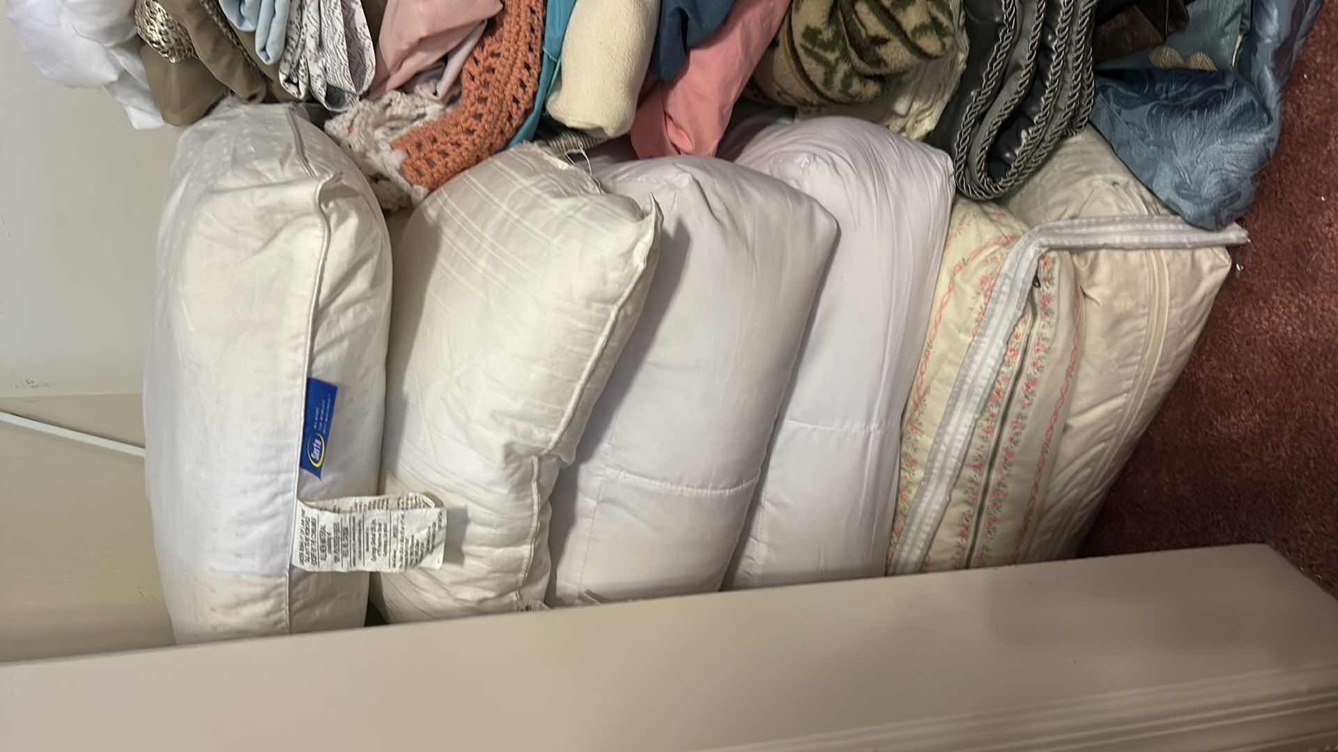 Photo 1 of CONTENTS OF CLOSET- PILLOWS, SHEETS, BEDDING AND MORE