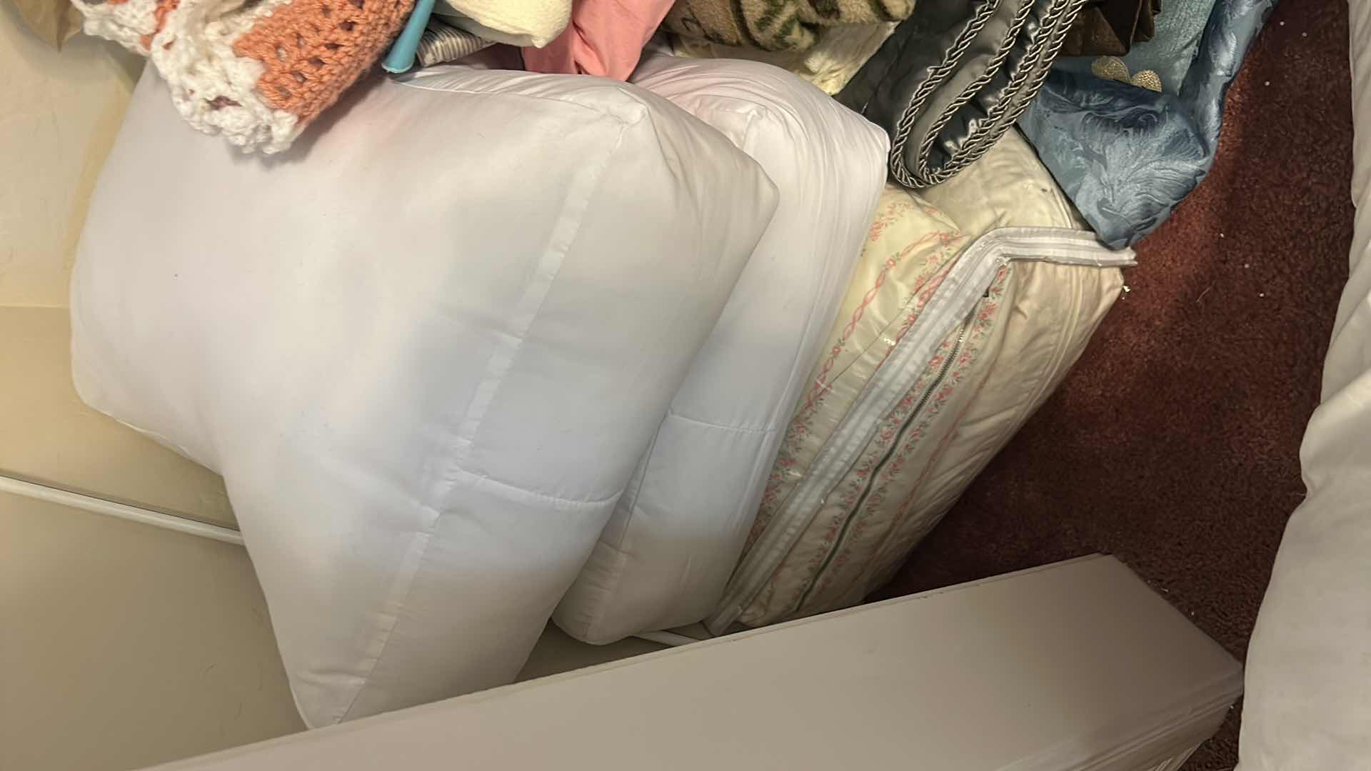 Photo 1 of CONTENTS OF CLOSET- PILLOWS, SHEETS, BEDDING AND MORE