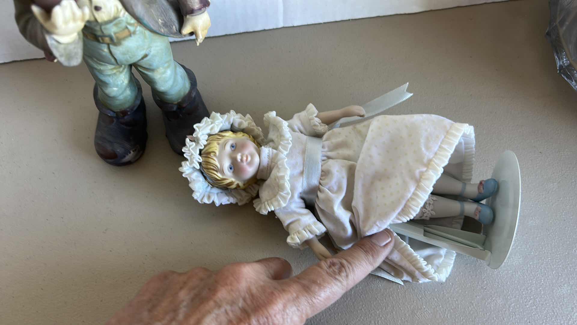 Photo 1 of 2 PORCELAIN FIGURINES  (TALLEST H 9”)